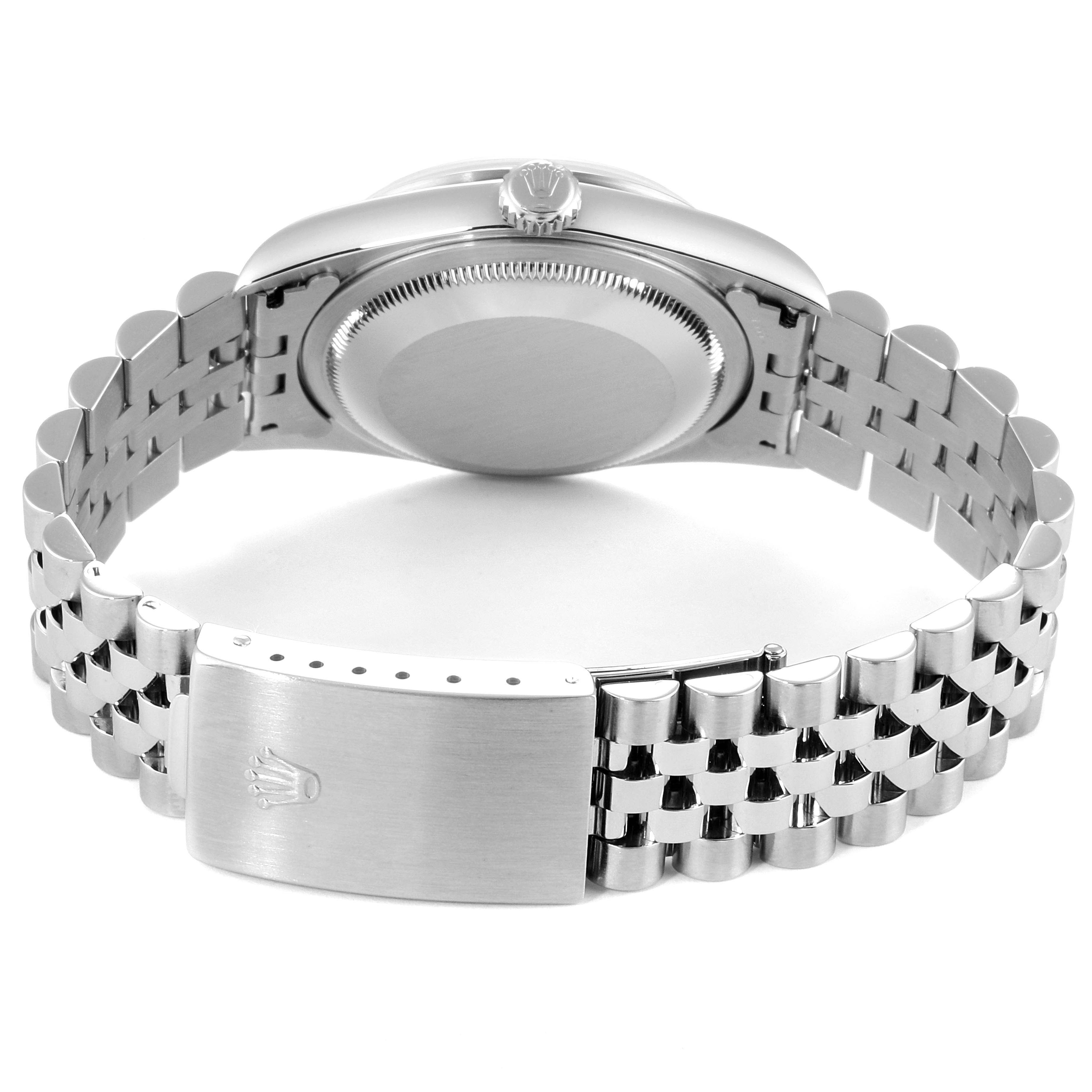 The image shows the back view of a Rolex Datejust 16200 Men's Stainless Steel Silver Dial 16200 Men's Stainless Steel Silver Dial watch, highlighting the case back and the bracelet with the clasp.