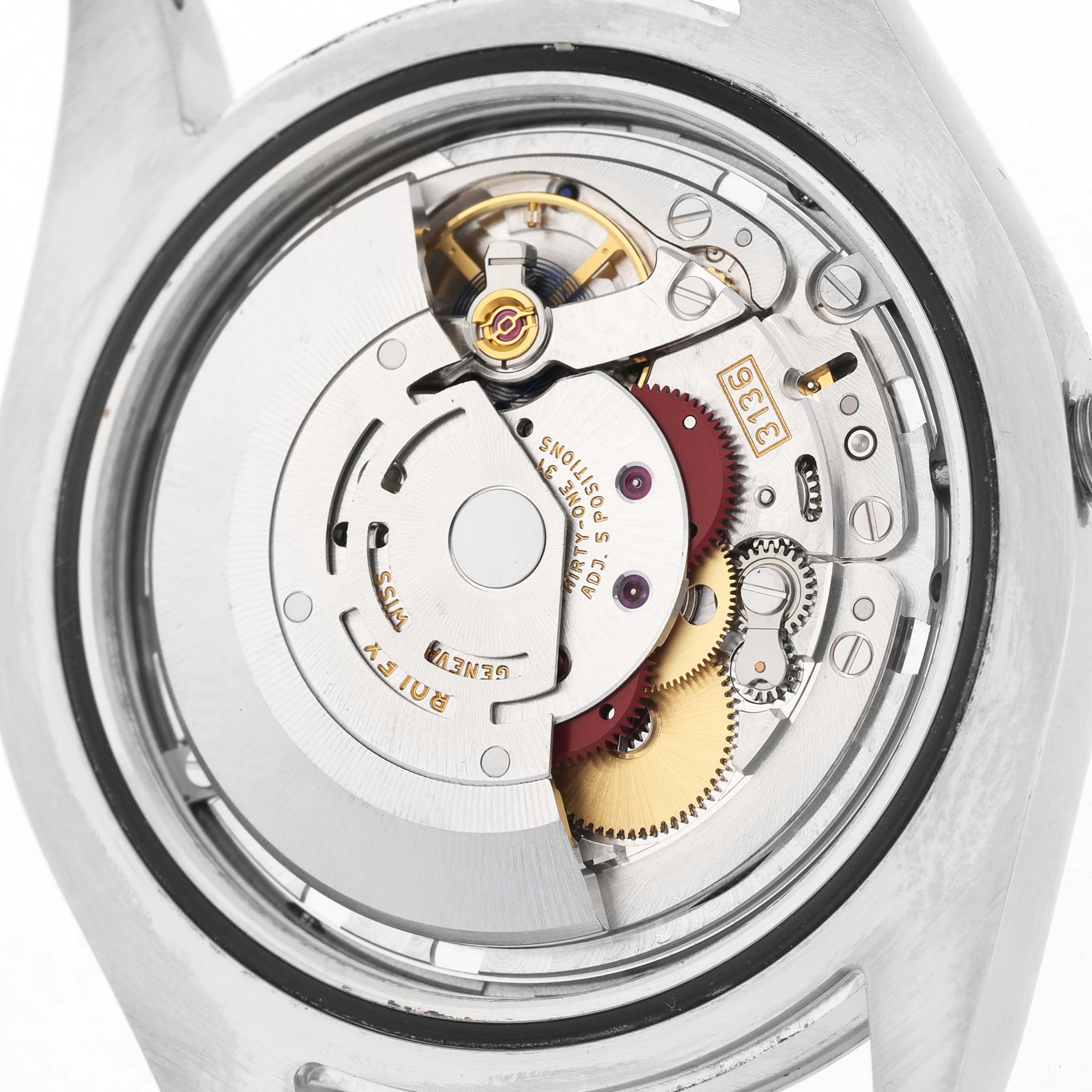 The image shows the movement and internal mechanism of a Rolex Datejust 41 116334 Men's Stainless Steel Silver Dial from the back.