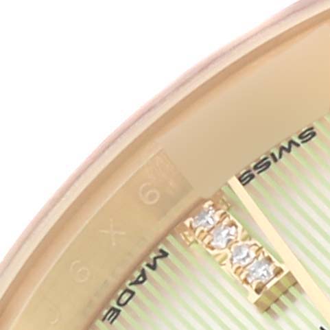 The close-up image shows the dial and bezel of a Rolex President 279138 Women's Yellow Gold Green Dial 279138 Women's Yellow Gold Green Dial watch with gold detailing and diamond hour markers.