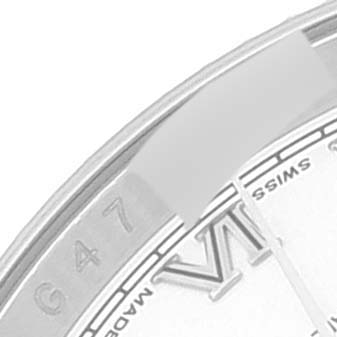 This image shows a close-up of a portion of the dial and rehaut of a Rolex Datejust 116234 Men's Stainless Steel White Dial 116234 Men's Stainless Steel White Dial watch, highlighting the Roman numeral VI and engraved details.
