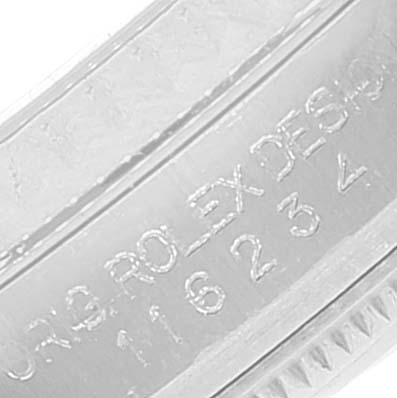 This image shows a close-up of the inner bezel with etched text of the Datejust model by Rolex.