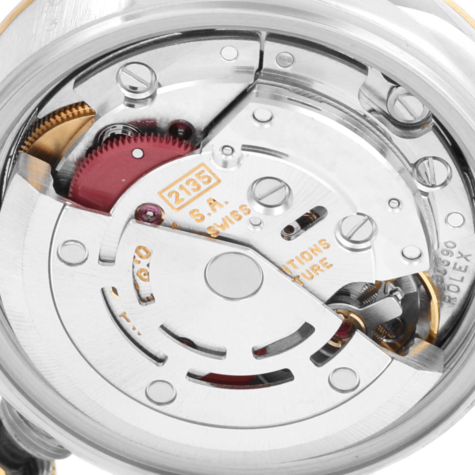 The image shows a close-up view of the movement mechanism of a Rolex Datejust 69173 Women
s Steel and Gold (two tone) Grey Dial 69173 Women
s Steel and Gold (two tone) Grey Dial watch.