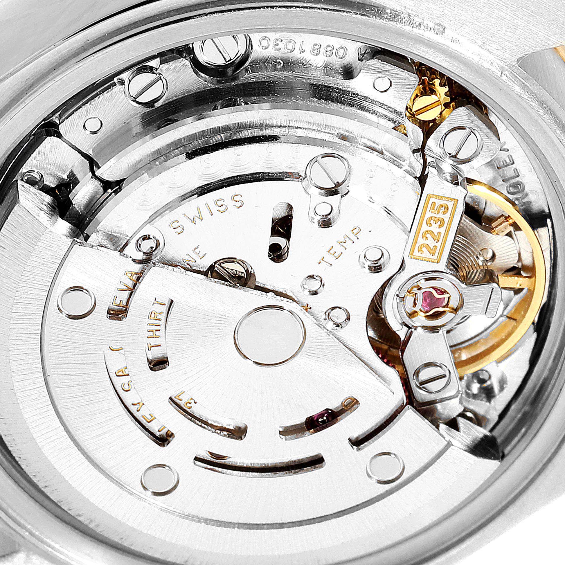 The image shows a close-up view of the movement mechanism inside a Rolex Datejust 79173 Women
s Steel and Gold (two tone) Mother of Pearl Dial 79173 Women
s Steel and Gold (two tone) Mother of Pearl Dial watch.