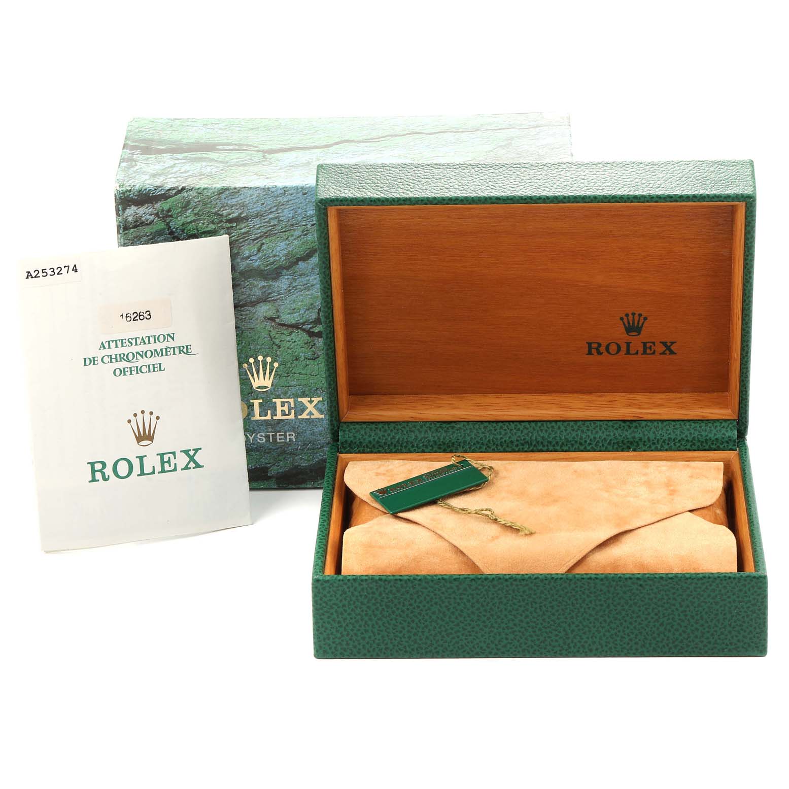This image shows the open box, certificate, and tag for a Rolex Turn-o-Graph 16263 Men
s Steel and Gold (two tone) White Dial 16263 Men
s Steel and Gold (two tone) White Dial watch.