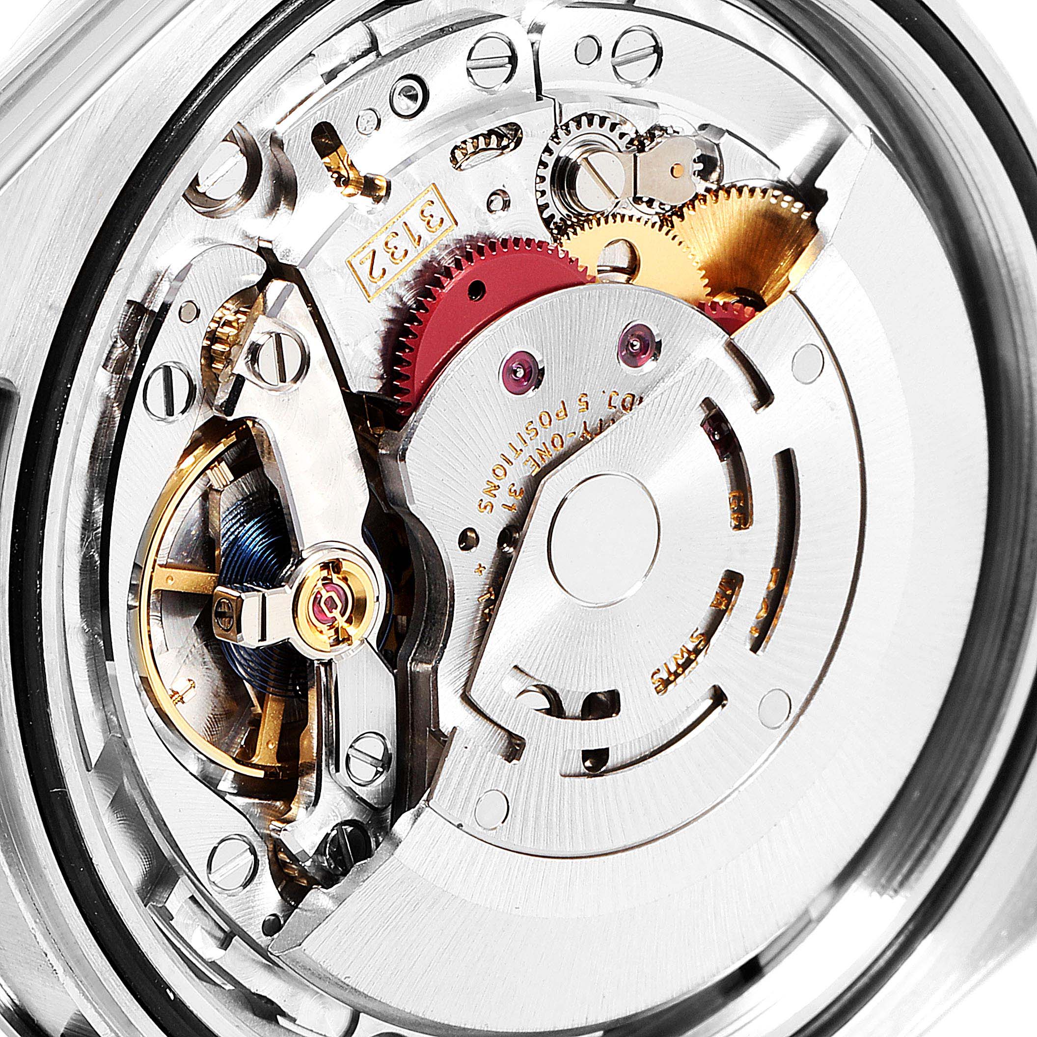 This is a close-up shot of the inner mechanical movement of the Rolex Explorer 214270 Men
s Stainless Steel Black Dial 214270 Men
s Stainless Steel Black Dial watch.