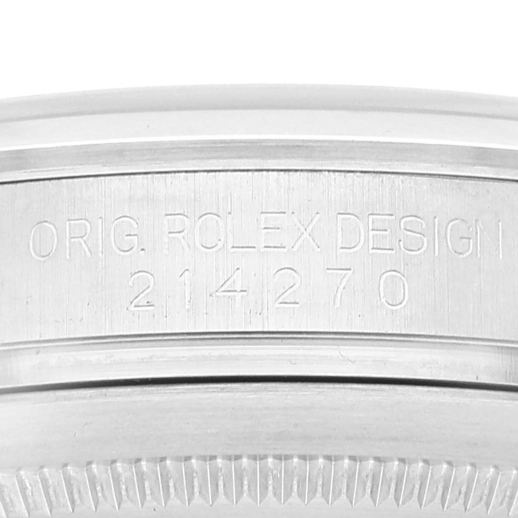 This image shows the case back engraving and reference number of a Rolex Explorer 214270 Men's Stainless Steel Black Dial 214270 Men's Stainless Steel Black Dial model watch.