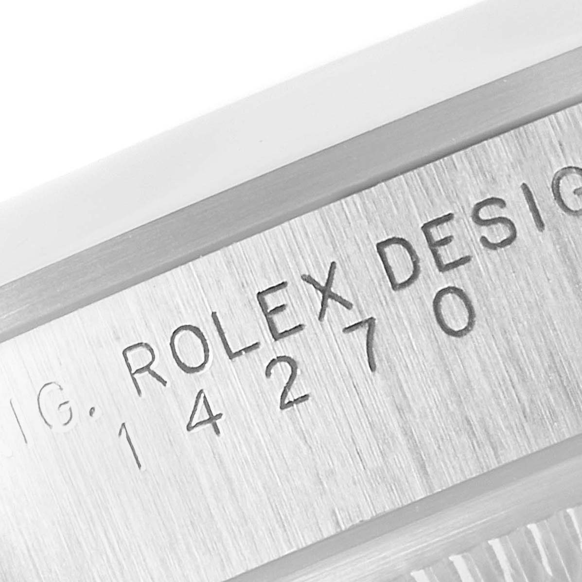 The image shows an angled macro view of the engraved model details on the side of a Rolex Explorer 14270 Men's Stainless Steel Black Dial 14270 Men's Stainless Steel Black Dial watch.