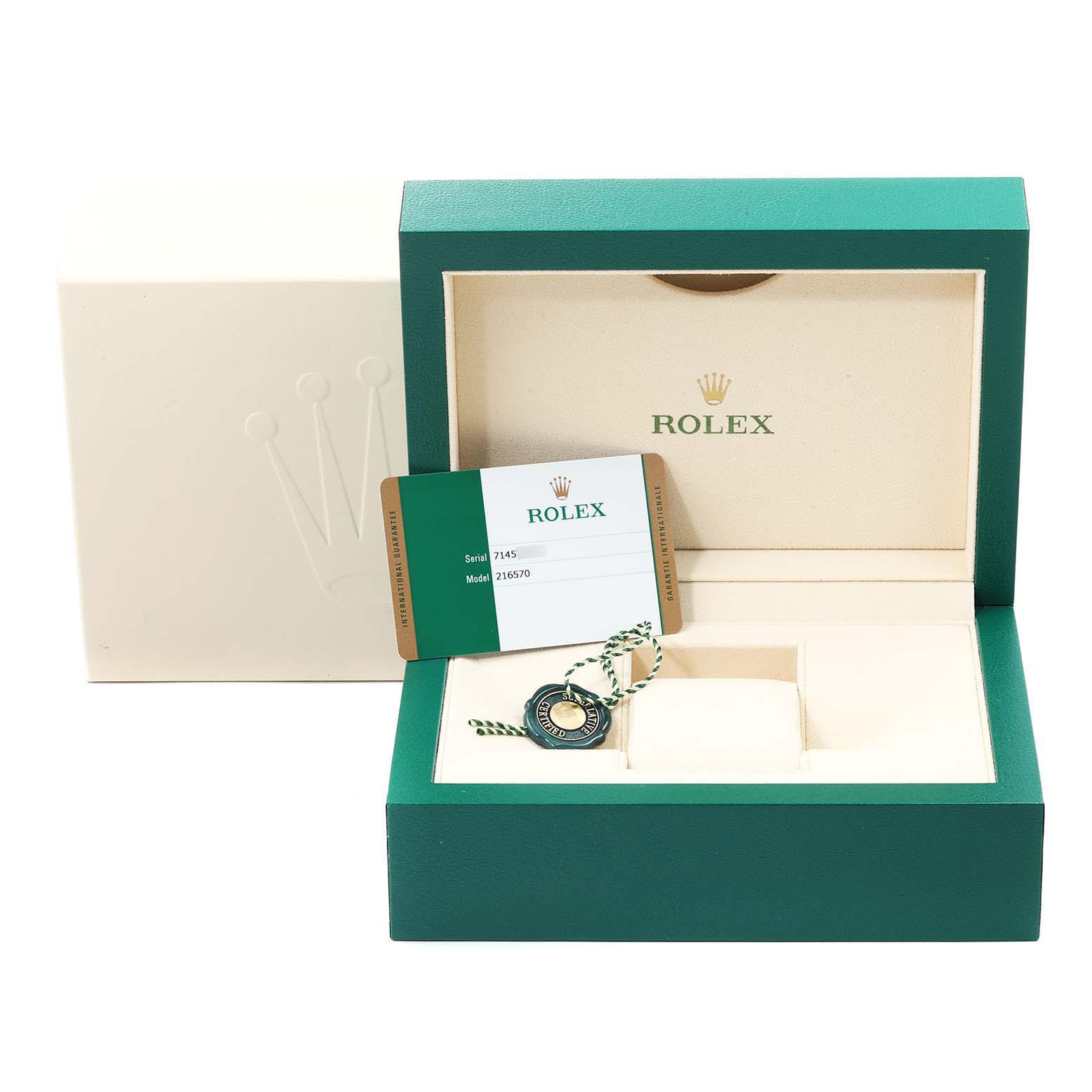 The image shows an open green Rolex box for the Explorer model, displaying a warranty card and a tag.