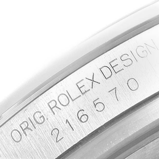 This image shows a close-up of the case side of a Rolex Explorer 216570 Men
s Stainless Steel White Dial 216570 Men
s Stainless Steel White Dial, displaying the engraved model number "216570".