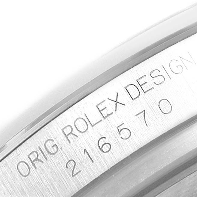 This image shows a close-up of the engraved inner bezel of a Rolex Explorer 216570 Men
s Stainless Steel White Dial 216570 Men
s Stainless Steel White Dial watch, featuring the design number "216570".