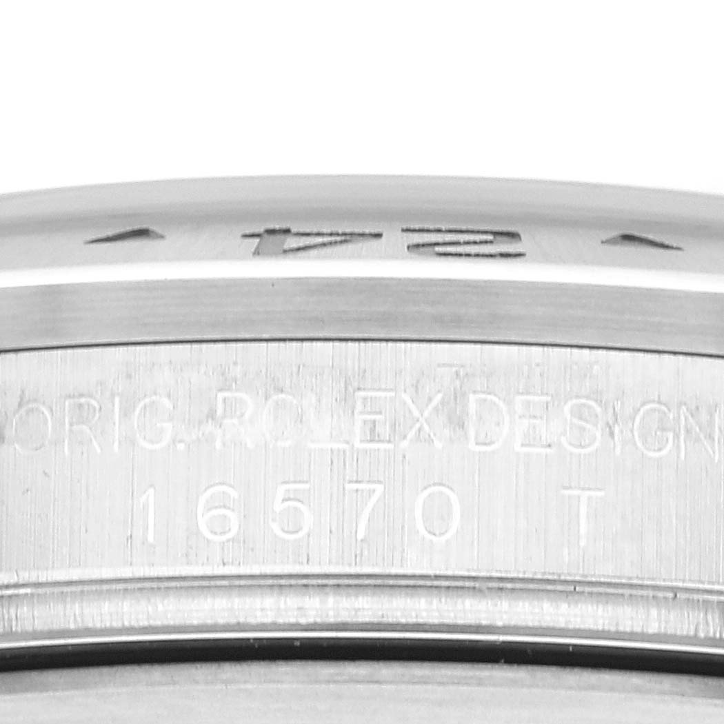 The image shows a close-up of the model number and engraving on the case back of a Rolex Explorer 16570 Men's Stainless Steel Black Dial 16570 Men's Stainless Steel Black Dial.