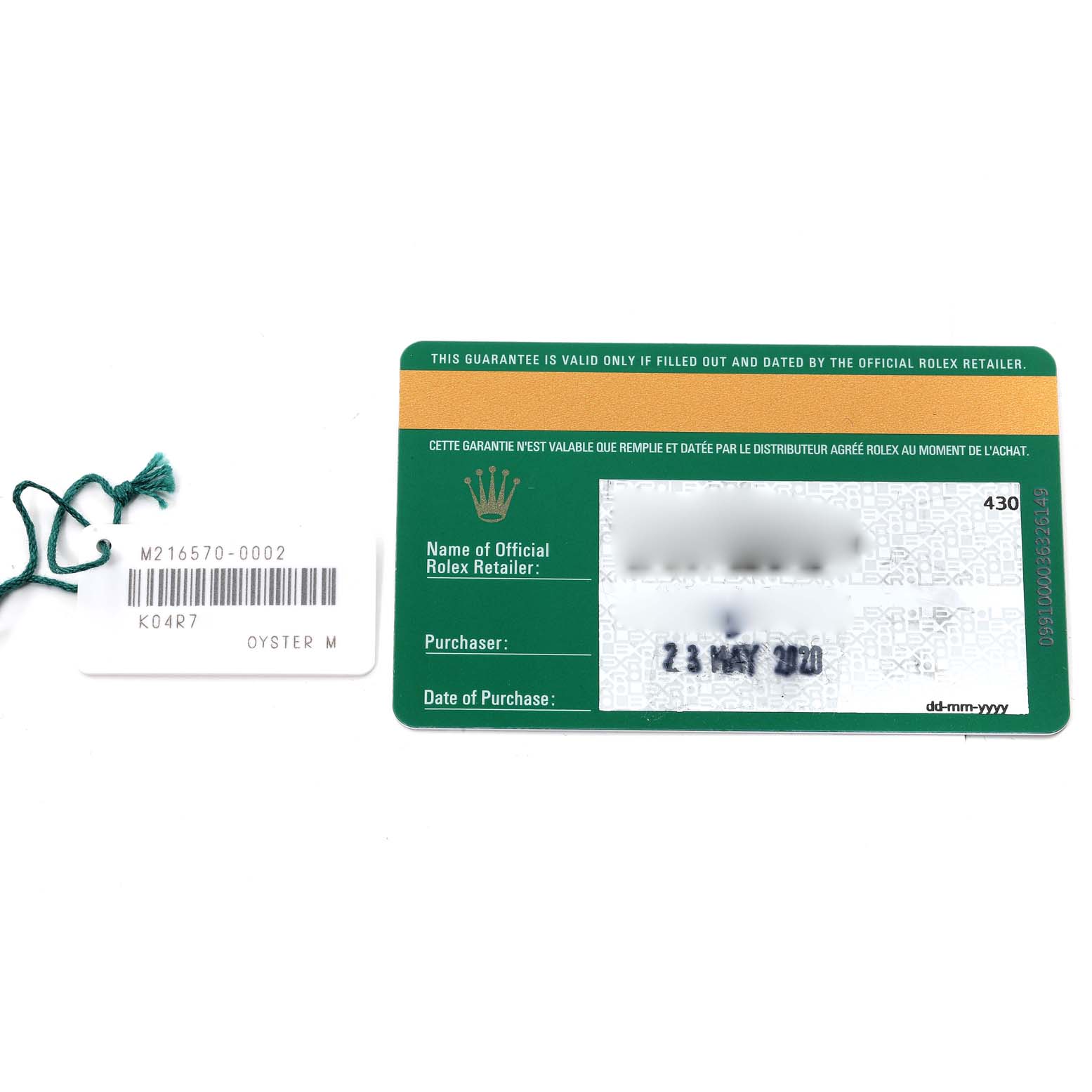 The image shows the warranty card and hang tag with the serial number for the Rolex Explorer 216570 Men
s Stainless Steel Black Dial 216570 Men
s Stainless Steel Black Dial model.