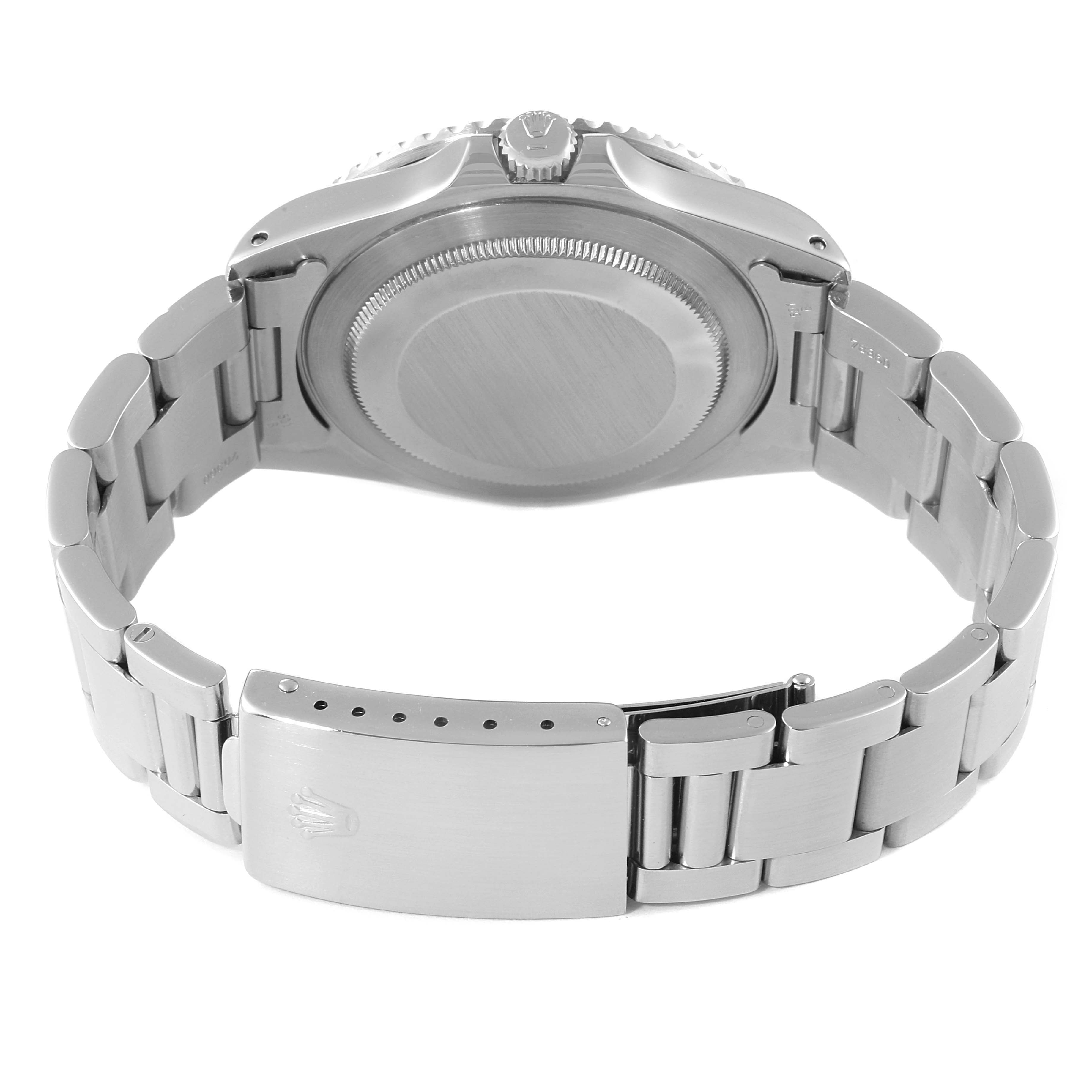 This image shows the back case, crown, and bracelet clasp of a Rolex GMT-Master 16700 Men
s Stainless Steel Black Dial 16700 Men
s Stainless Steel Black Dial watch.