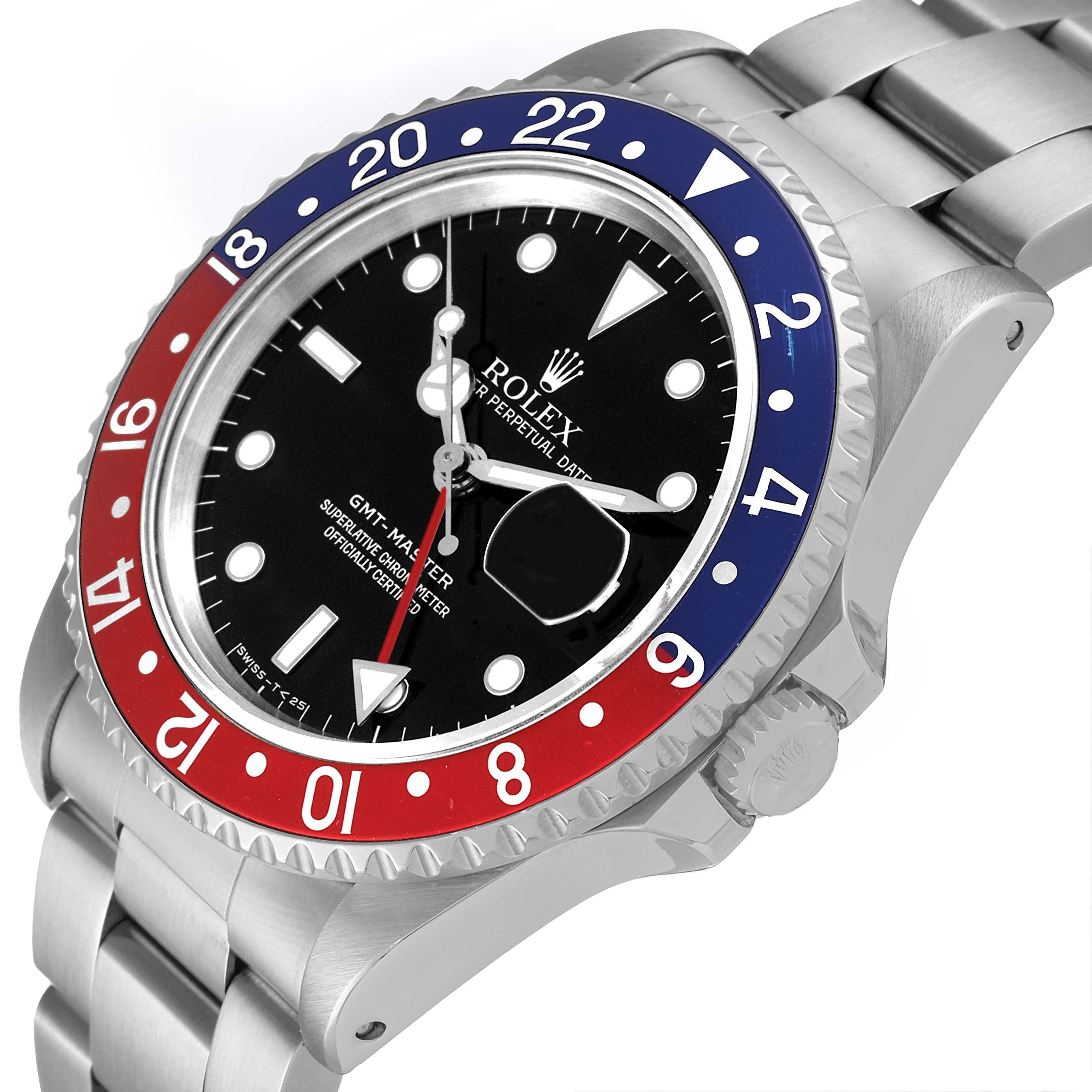 This image shows a close-up, angled view of the dial and bezel of the Rolex GMT-Master 16700 Men
s Stainless Steel Black Dial 16700 Men
s Stainless Steel Black Dial watch.
