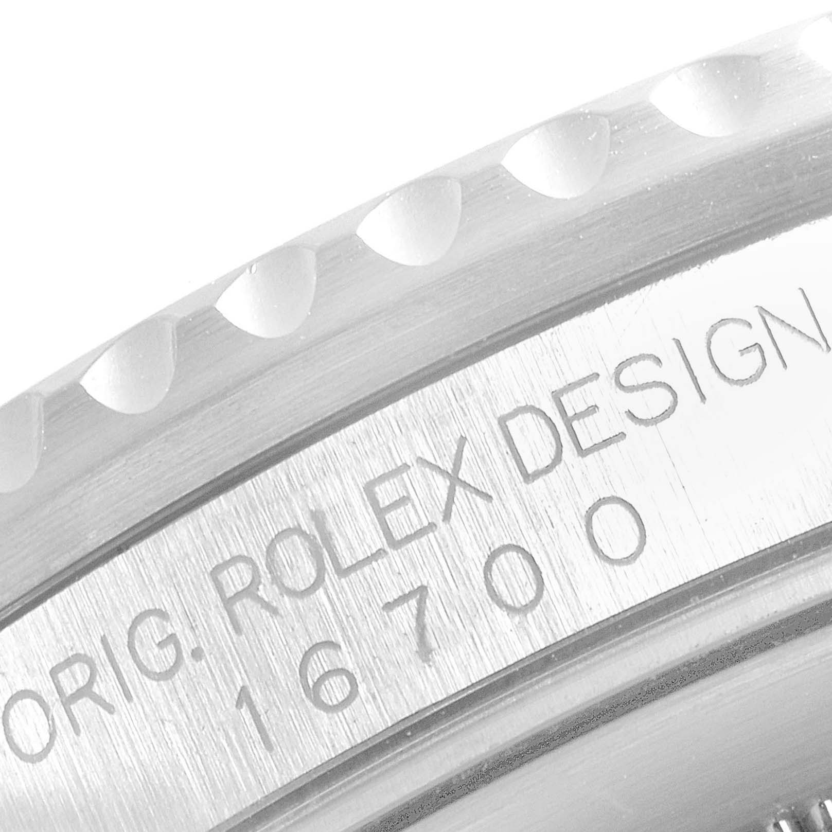 This close-up image shows the bezel and the engraved model number of a Rolex GMT-Master 16700 Men
s Stainless Steel Black Dial 16700 Men
s Stainless Steel Black Dial watch.