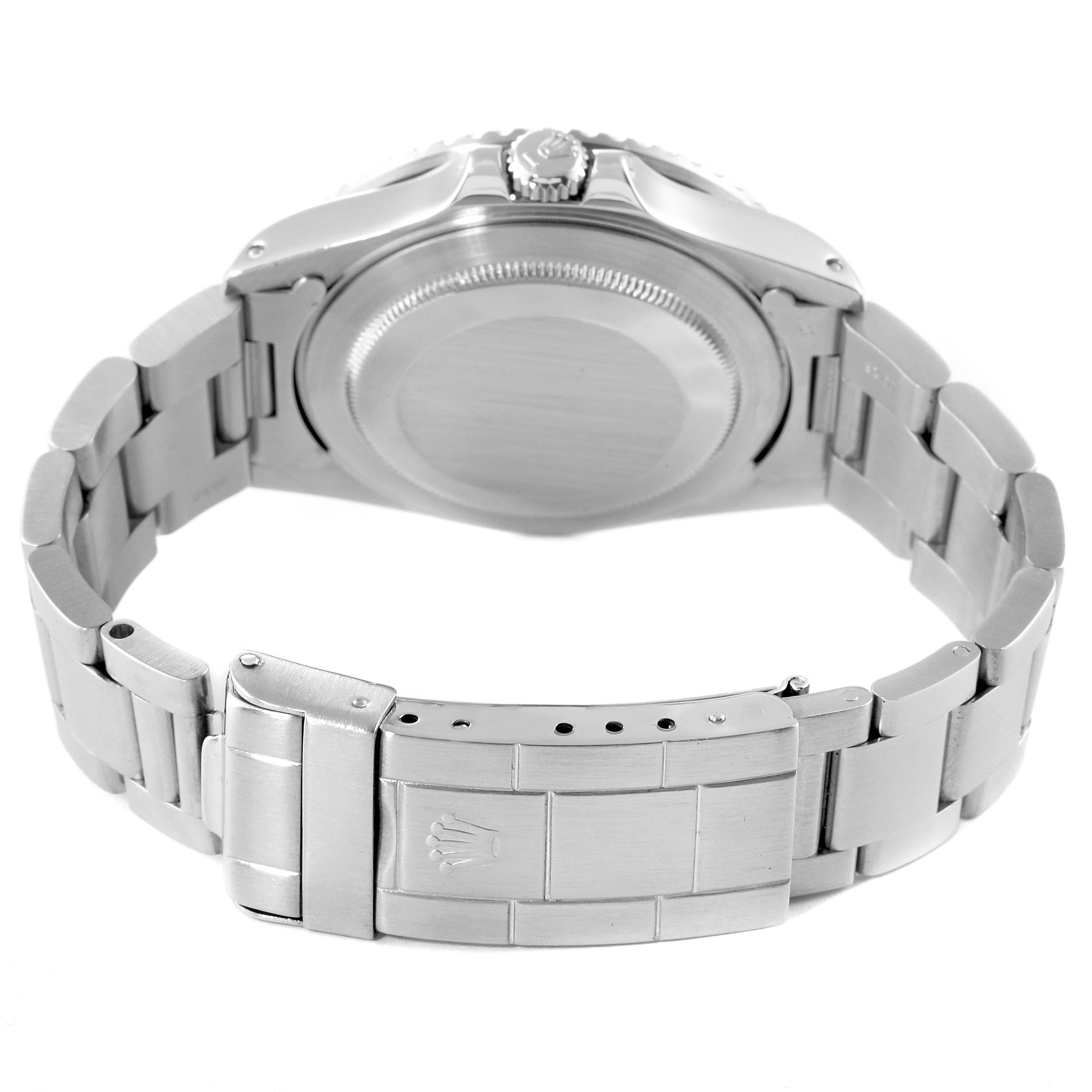 The image shows the back and clasp of a Rolex Vintage Collection 16760 Men's Stainless Steel Black Dial 16760 Men's Stainless Steel Black Dial watch, prominently displaying its metal band and crown.