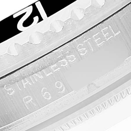 The image shows a close-up of the stainless steel case and bezel markings of a Rolex Vintage Collection 16760 Men's Stainless Steel Black Dial 16760 Men's Stainless Steel Black Dial watch.