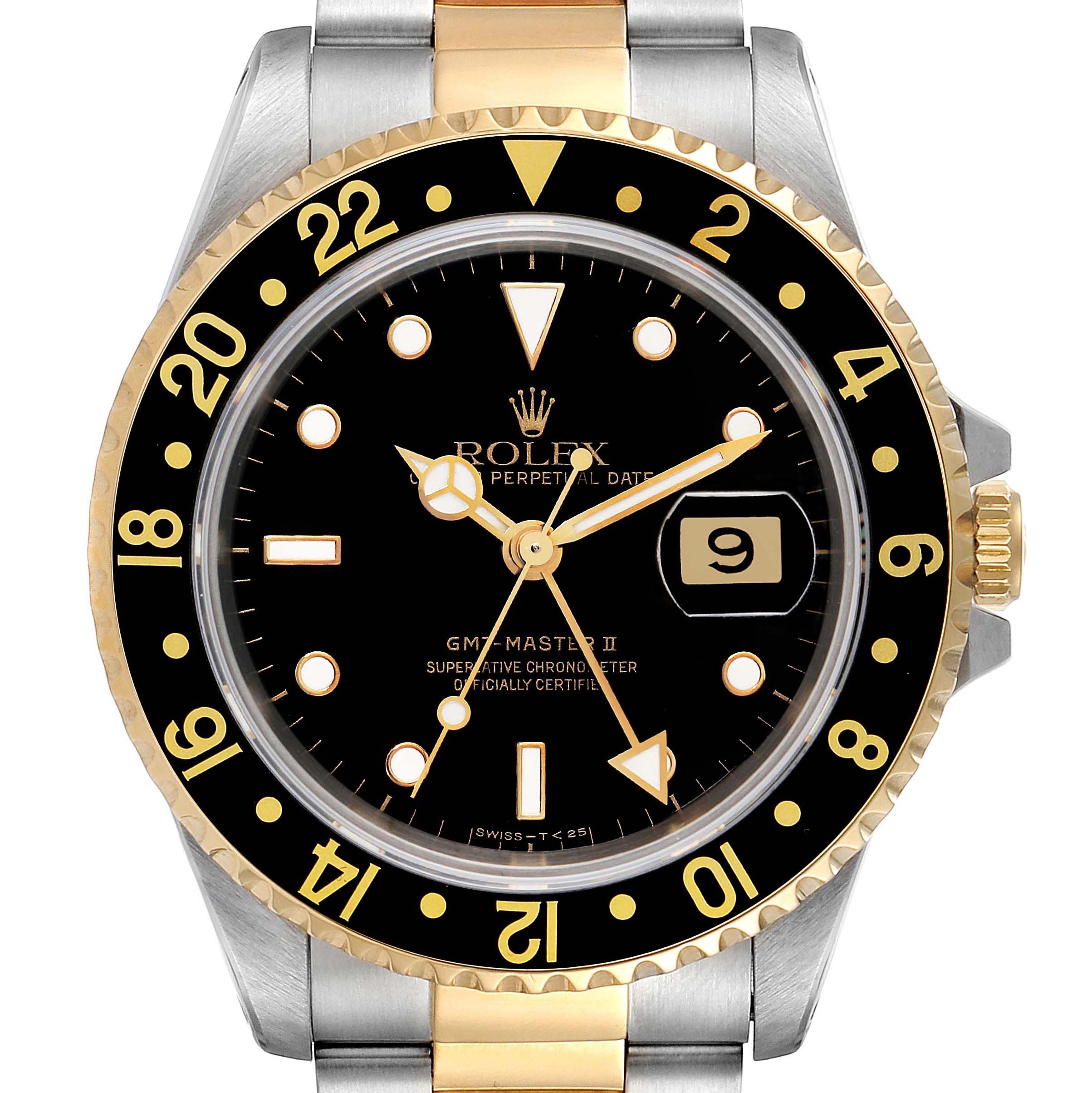 The image shows a front view of a Rolex GMT-Master 16713 Men's Steel and Gold (two tone) Black Dial 16713 Men's Steel and Gold (two tone) Black Dial II watch, displaying its black dial, gold and silver bezel, and date window.