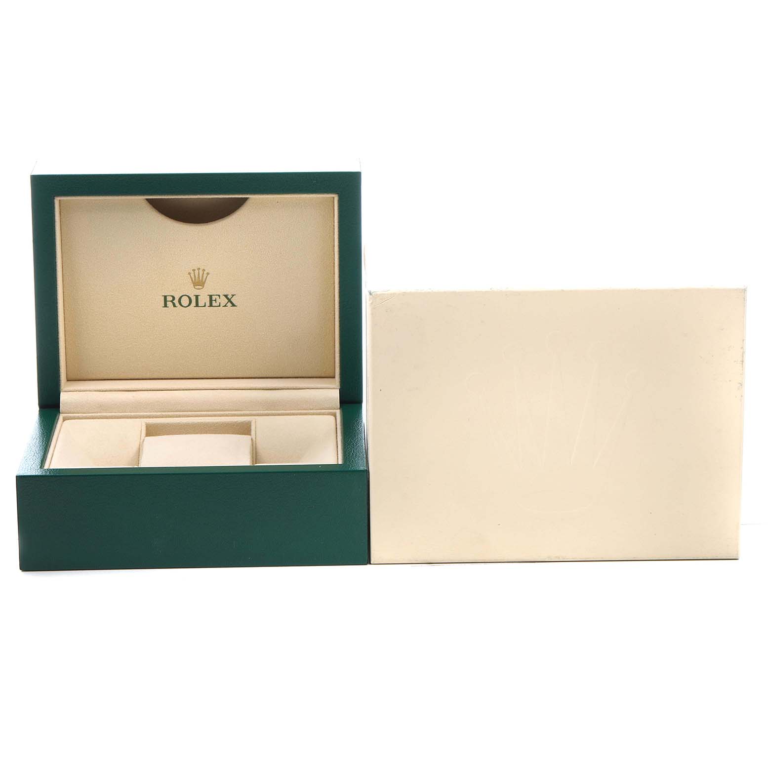 The image shows an open Rolex Oyster Perpetual 124200 Men's Stainless Steel Blue Dial watch box with a beige interior and empty compartments.