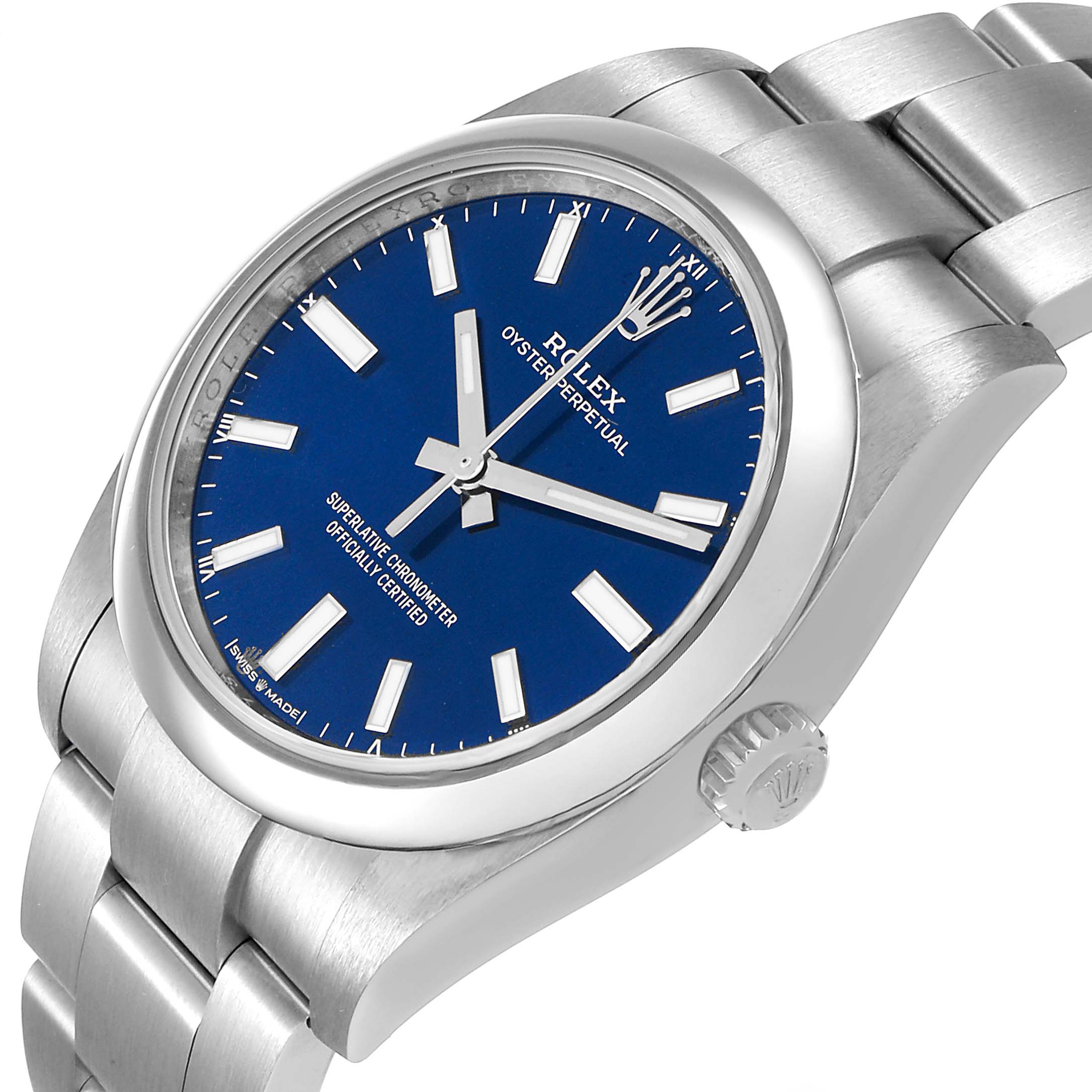 The Rolex Oyster Perpetual 124200 Men's Stainless Steel Blue Dial watch is shown at a slight side angle, displaying the blue dial, crown, and bracelet.