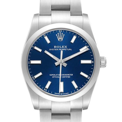 The Rolex Oyster Perpetual 124200 Men's Stainless Steel Blue Dial watch is shown from a frontal angle, displaying the face, crown, and part of the bracelet.