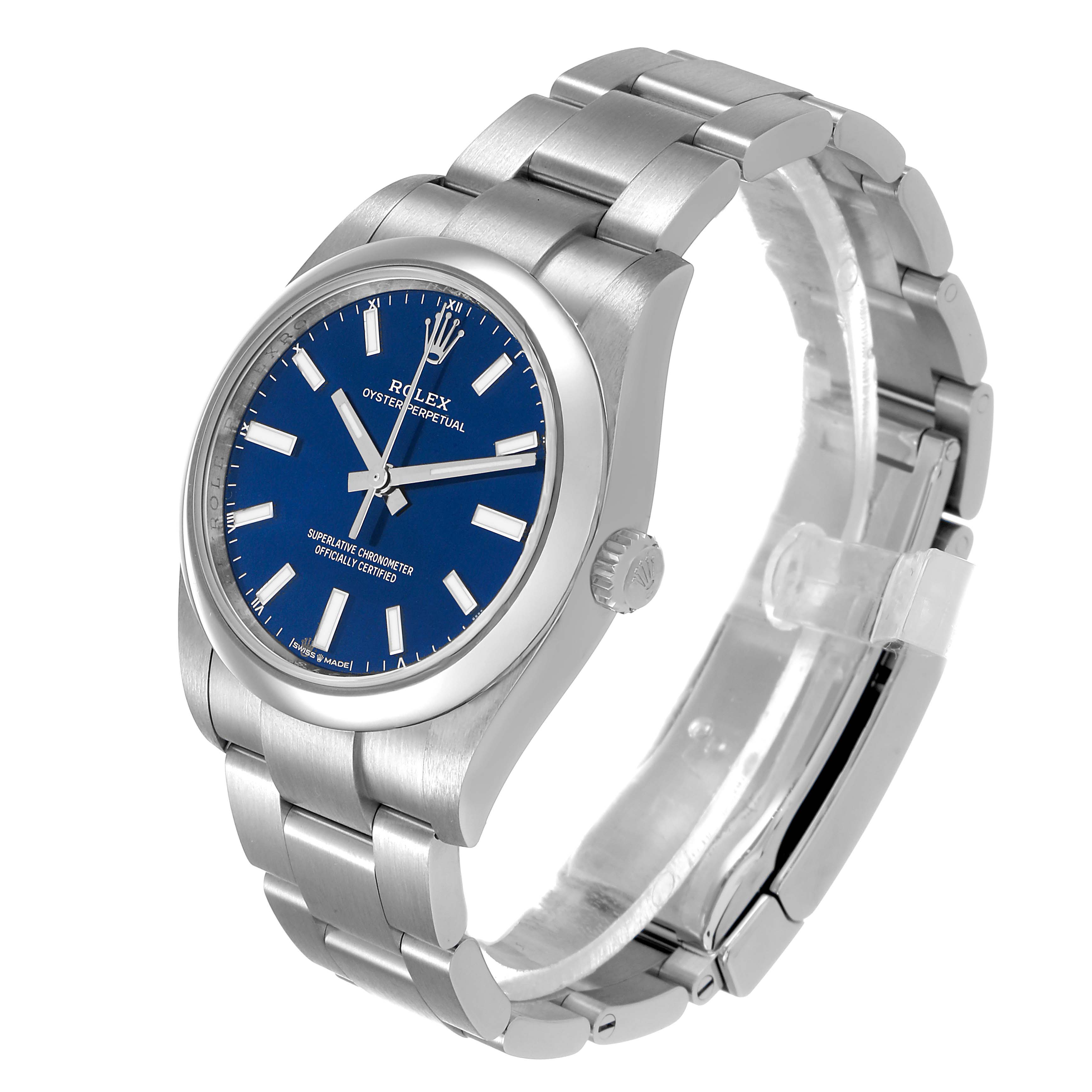 The Rolex Oyster Perpetual 124200 Men's Stainless Steel Blue Dial watch is shown at a three-quarter angle, displaying the face, bezel, bracelet, and crown.