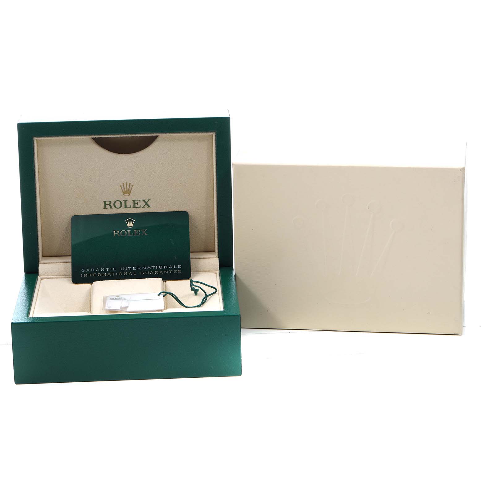 The image shows the packaging for a Rolex Oyster Perpetual 124200 Women's Stainless Steel Pink Dial, including the box, guarantee card, and a tag inside.