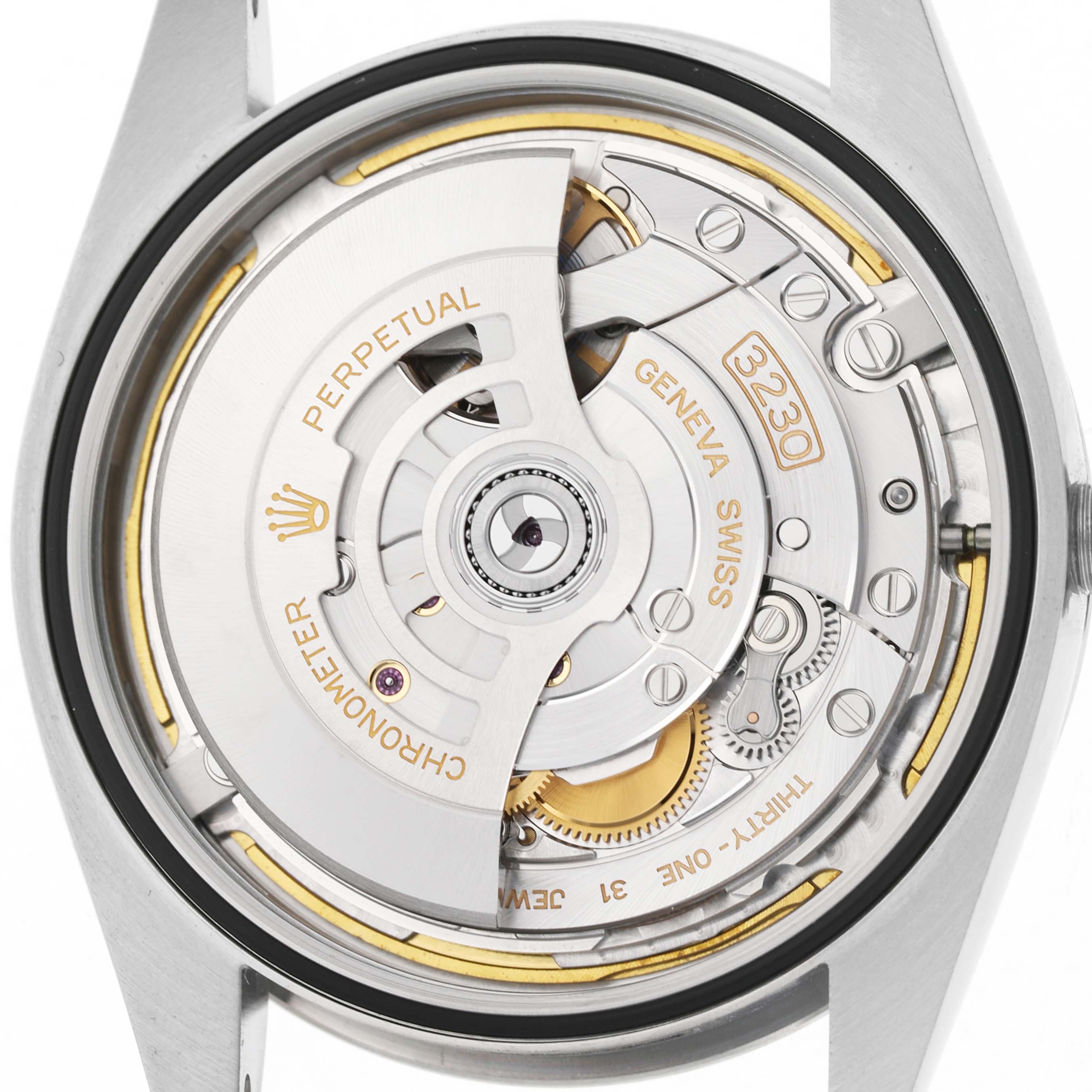 The image shows the back view of the Rolex Oyster Perpetual 134300 Men's Stainless Steel Beige Dial, highlighting its intricate mechanical movement.