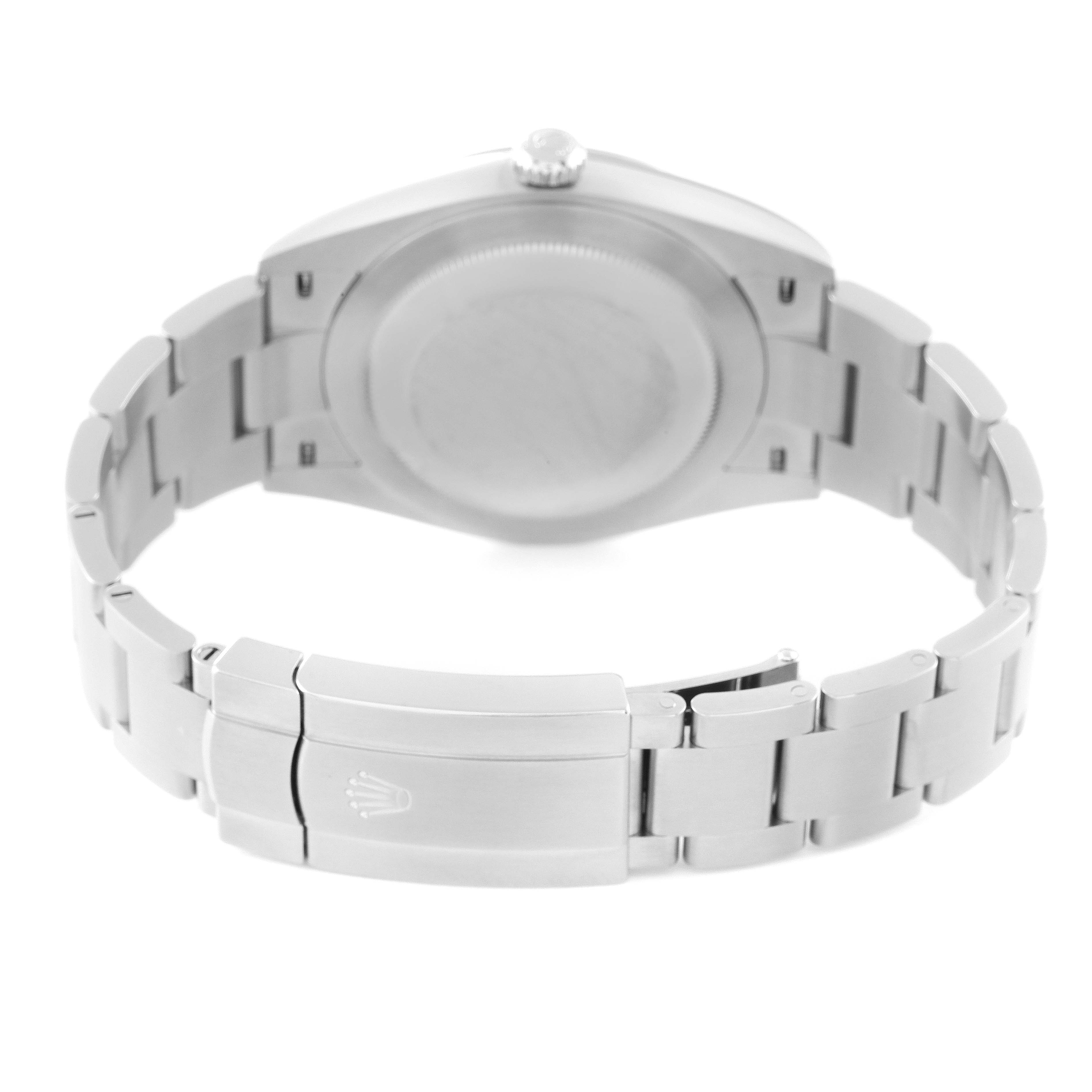 This image shows the back view of a Rolex Oyster Perpetual 124300 Men
s Stainless Steel Blue Dial 124300 Men
s Stainless Steel Blue Dial watch, highlighting the case back and the bracelet with a clasp.