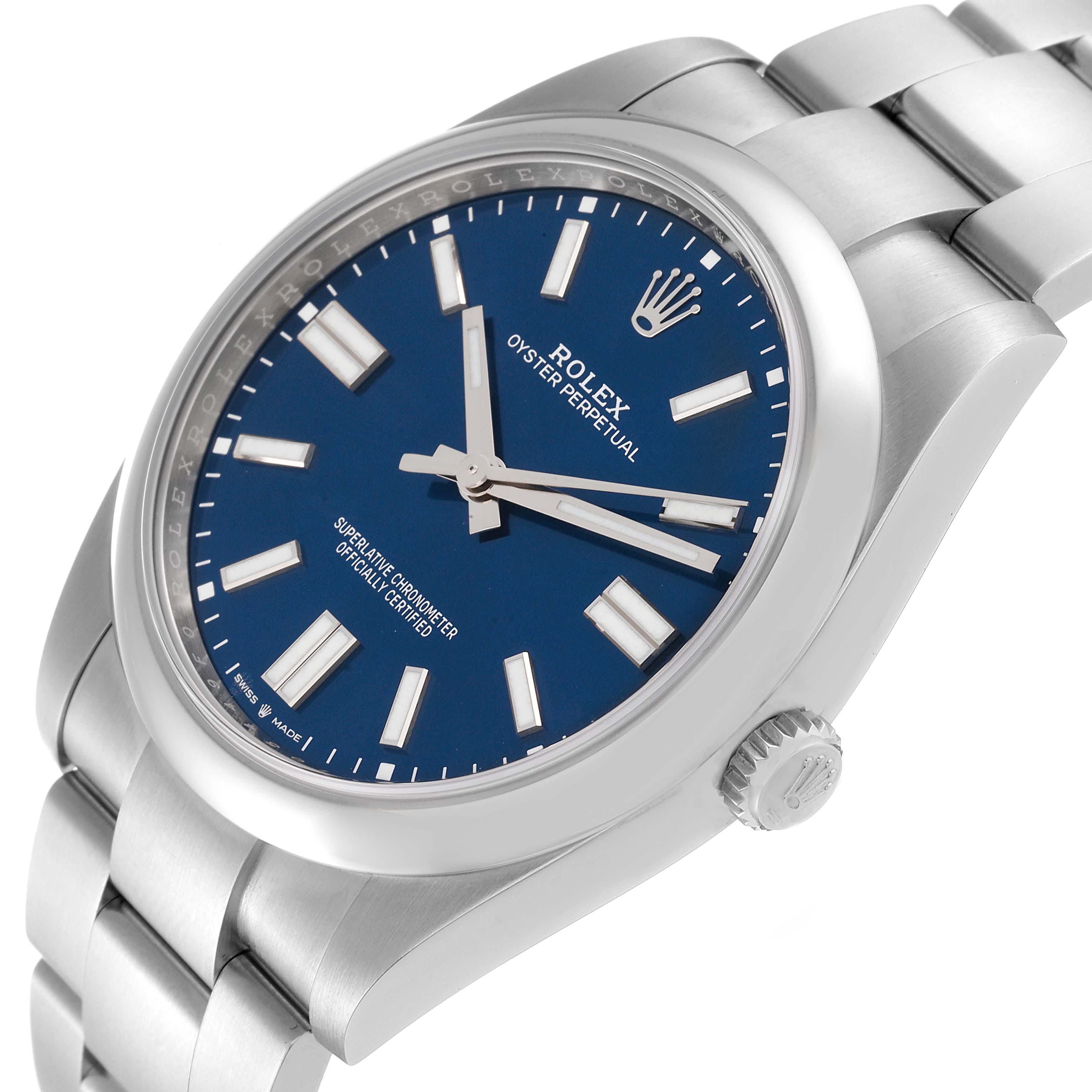The image shows a Rolex Oyster Perpetual 124300 Men
s Stainless Steel Blue Dial 124300 Men
s Stainless Steel Blue Dial watch from a three-quarter angle with a blue dial and silver bracelet.