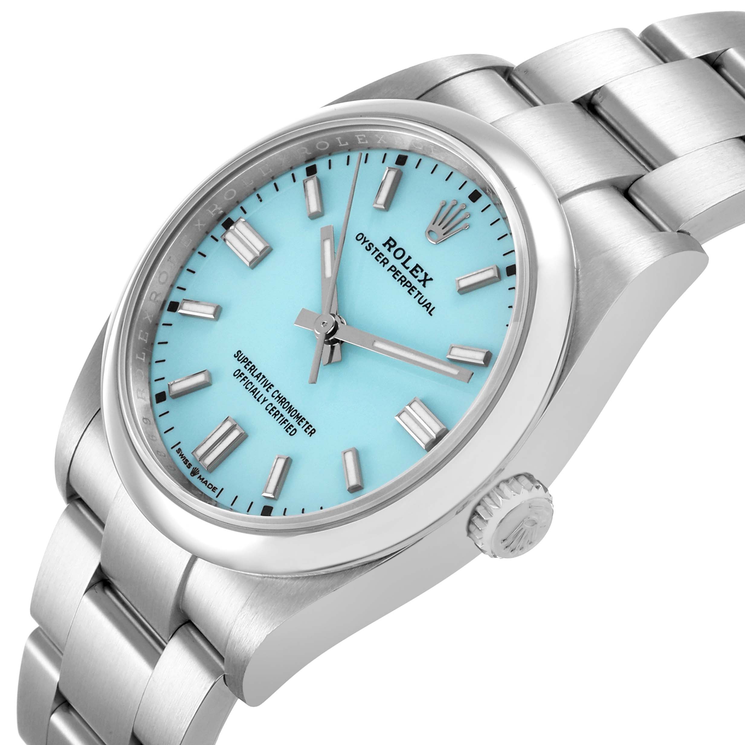 The Rolex Oyster Perpetual 126000 Men's Stainless Steel Blue Dial watch is shown from a slightly angled side view, displaying the dial, crown, and bracelet.