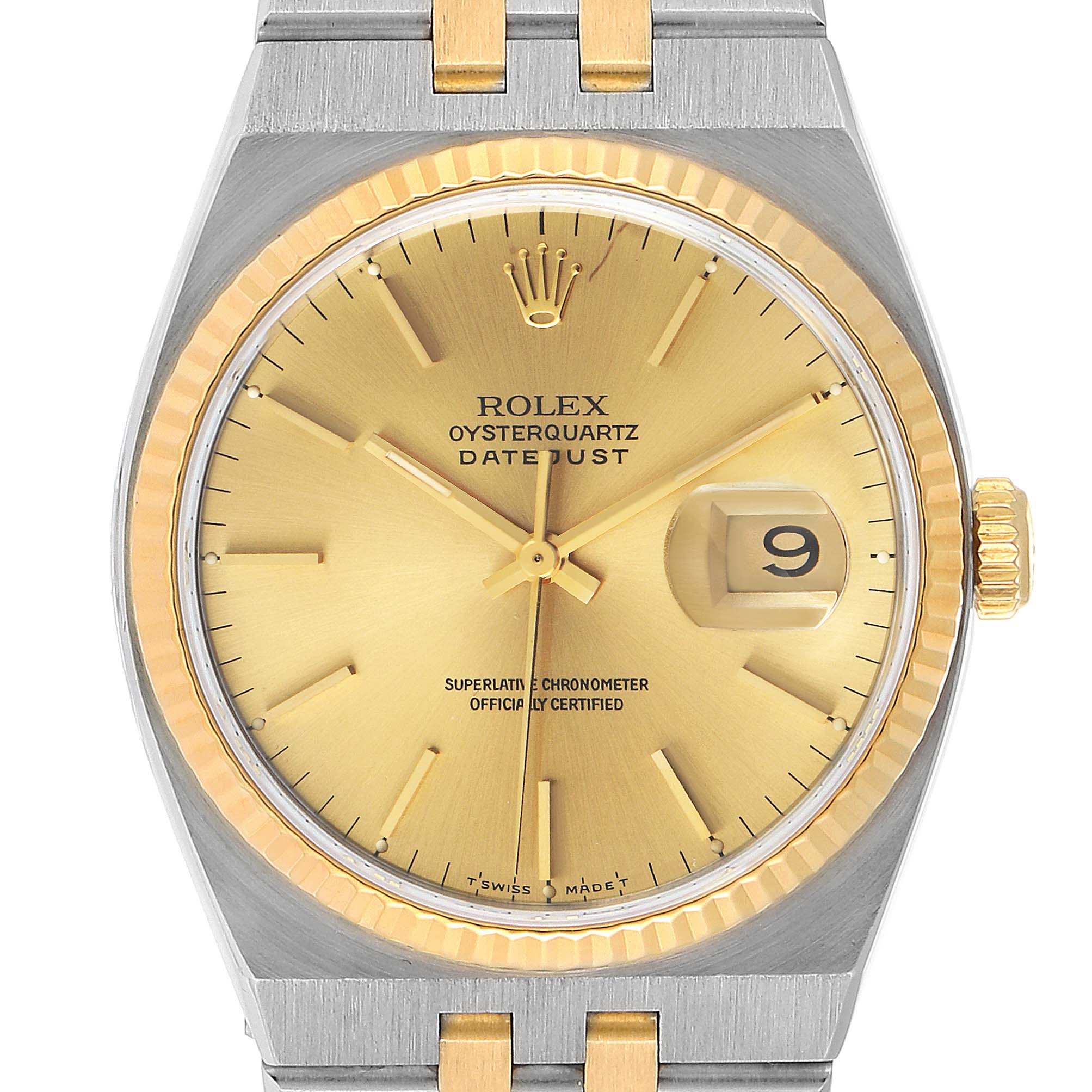 This image shows a close-up of the dial and bezel of a Rolex Oysterquartz 17013 Men's Steel and Gold (two tone) Champagne Dial 17013 Men's Steel and Gold (two tone) Champagne Dial Datejust watch, focusing on the face and crown.