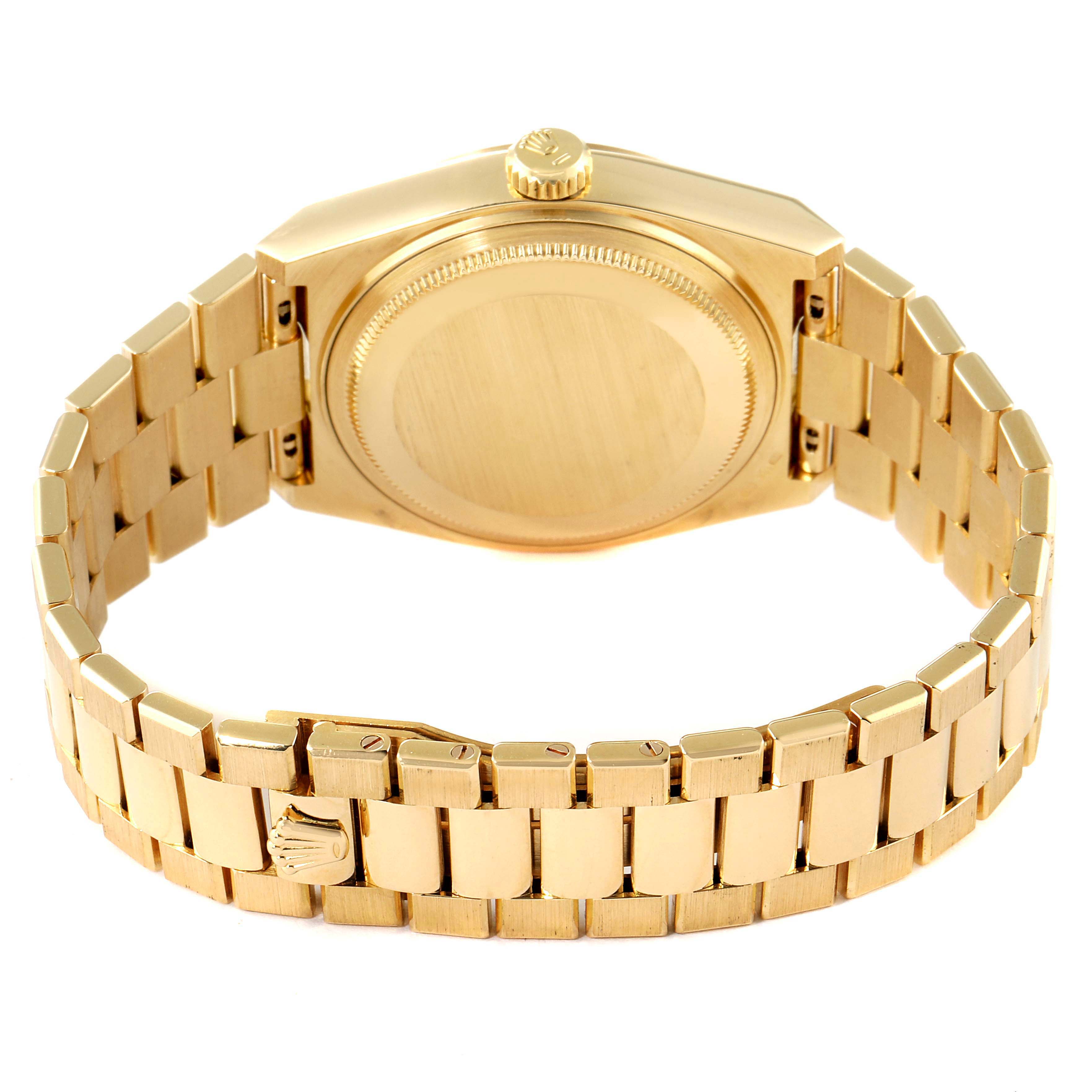 This image shows the Rolex Oysterquartz 19018 Men
s Yellow Gold Champagne Dial 19018 Men
s Yellow Gold Champagne Dial model from the back, highlighting the case back, crown, and bracelet.