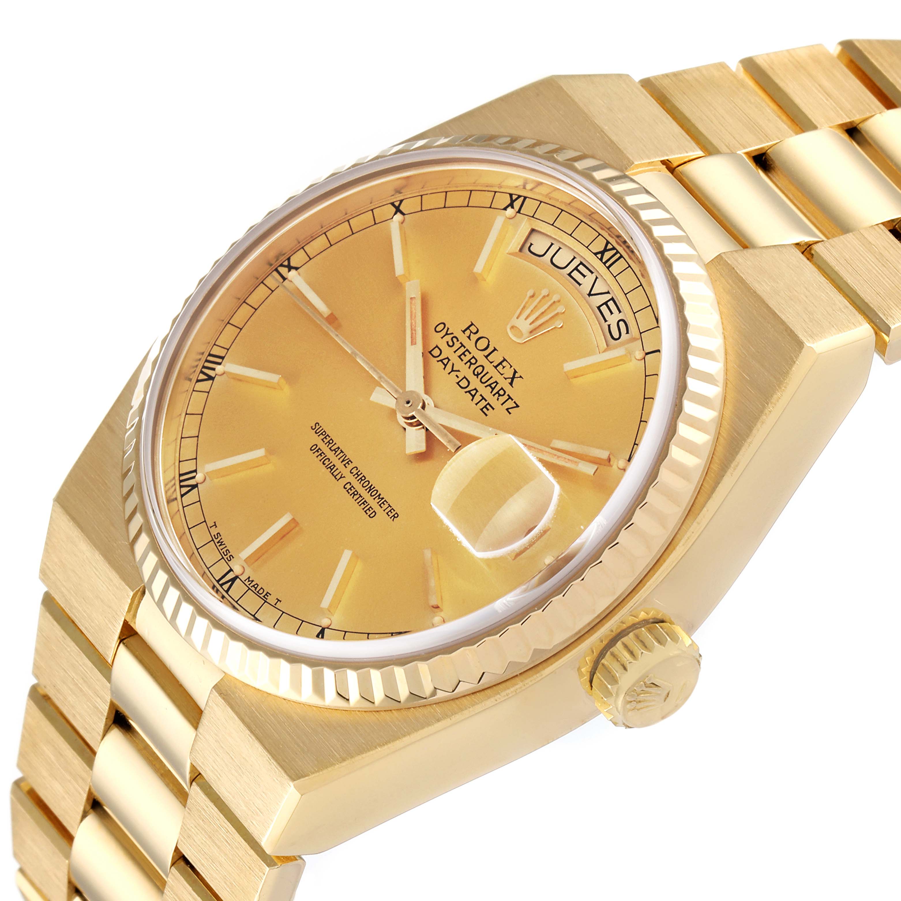 The image shows a close-up angled view of the Rolex Oysterquartz 19018 Men
s Yellow Gold Champagne Dial 19018 Men
s Yellow Gold Champagne Dial watch focusing on the dial, bezel, crown, and part of the bracelet.