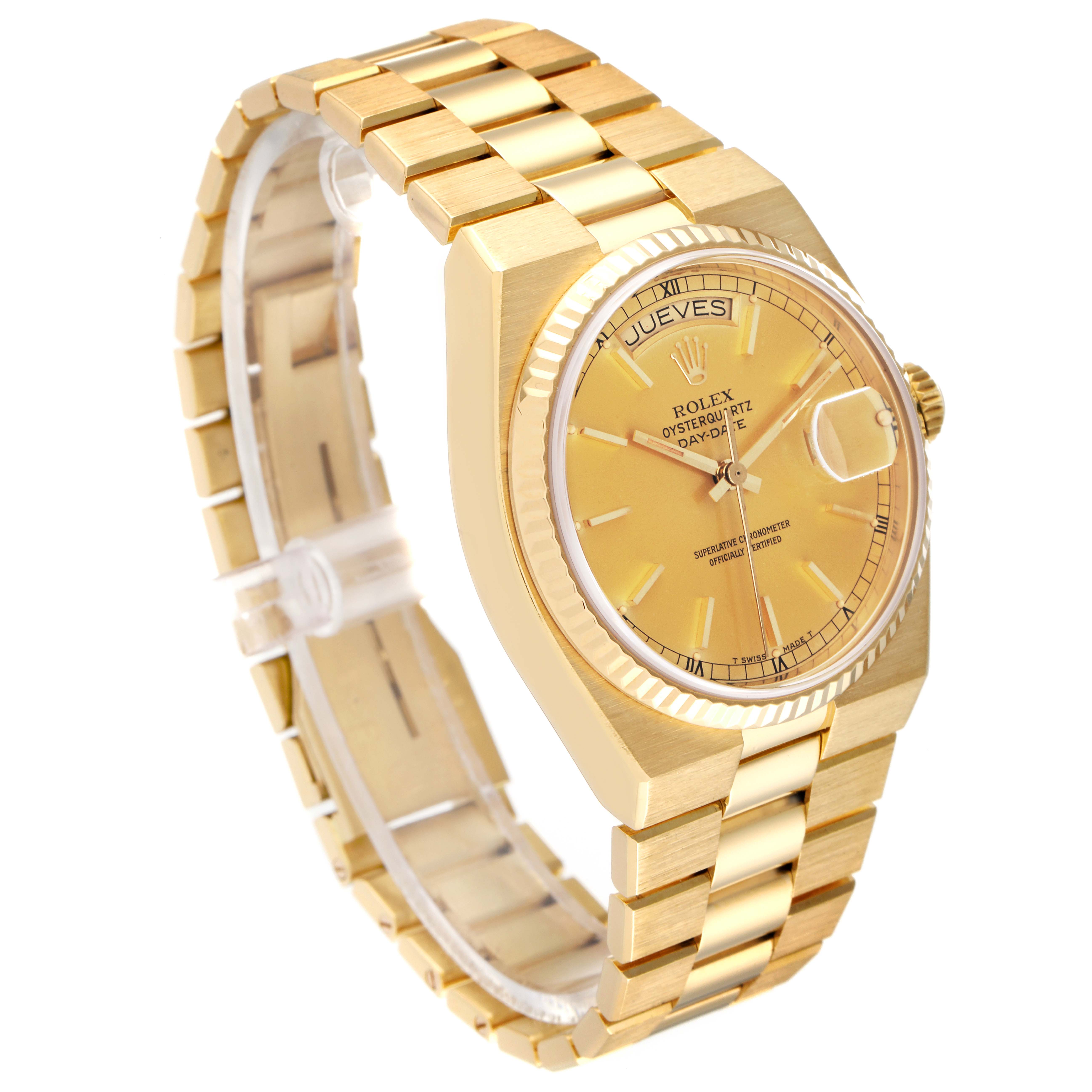 The image shows a Rolex Oysterquartz 19018 Men
s Yellow Gold Champagne Dial 19018 Men
s Yellow Gold Champagne Dial watch at an angle that highlights its face, bracelet, crown, and clasp.