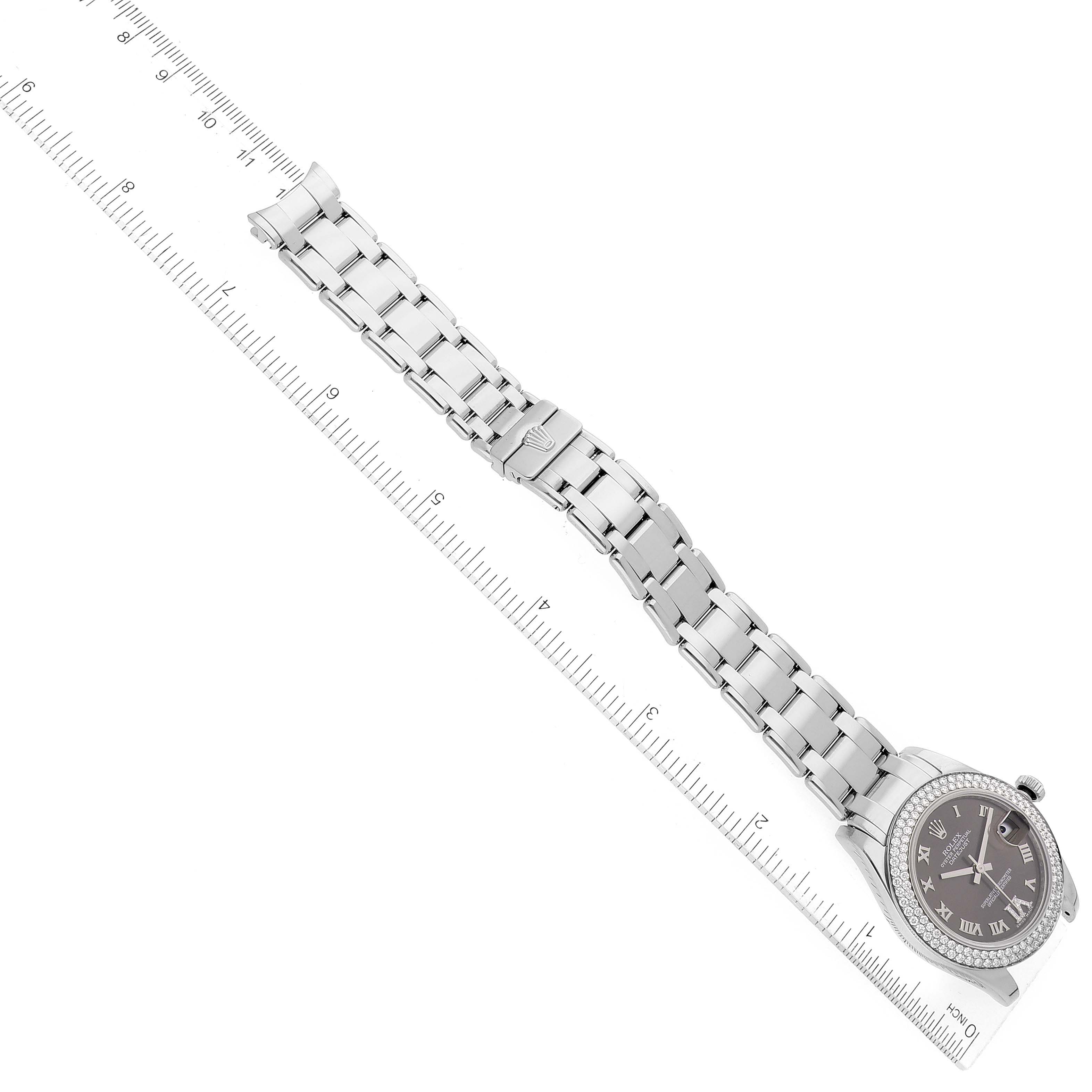 The image shows a Rolex Pearlmaster 81339 Women's White Gold Brown Dial 81339 Women's White Gold Brown Dial watch laid flat with its bracelet extended alongside a ruler for scale.