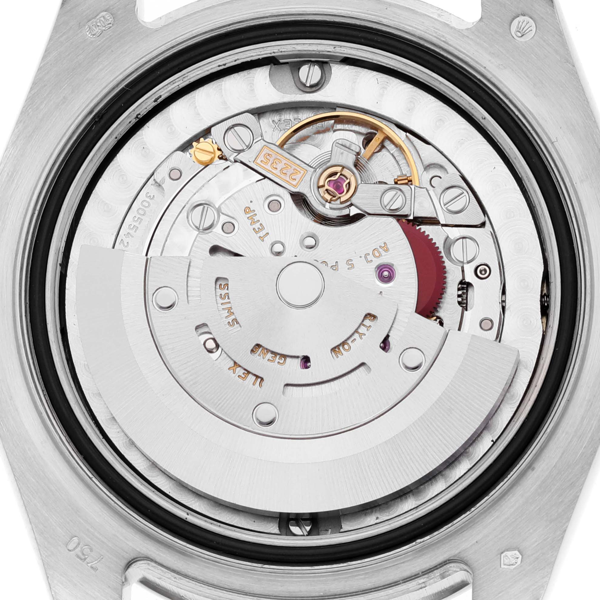 The image shows the movement mechanism from the backside of a Rolex Pearlmaster 81339 Women's White Gold Brown Dial 81339 Women's White Gold Brown Dial watch, featuring intricate gears and components.