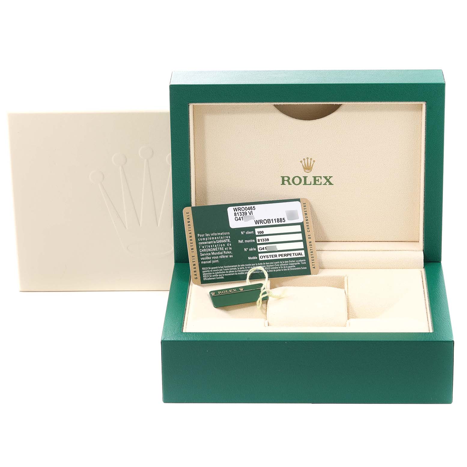 This image shows a Rolex Pearlmaster 81339 Women's White Gold Brown Dial 81339 Women's White Gold Brown Dial watch box and accessories, including a green tag and warranty card.