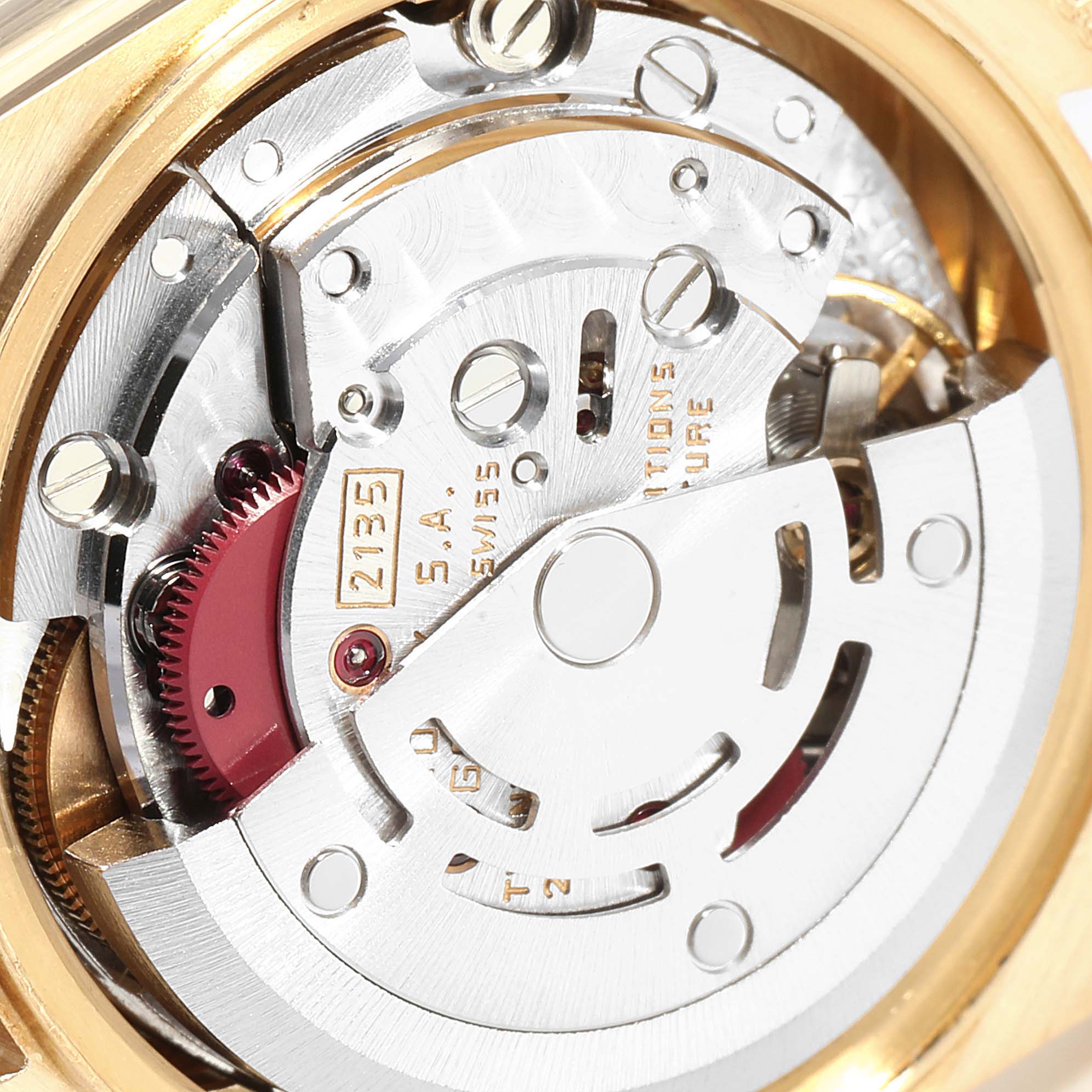 The image shows a close-up view of the movement mechanism of the Rolex President 69178 Women
s Yellow Gold Champagne Dial 69178 Women
s Yellow Gold Champagne Dial model watch.