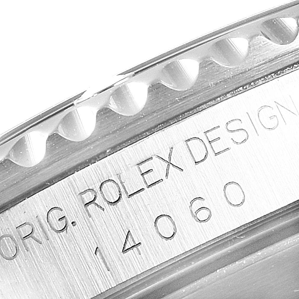The close-up angle shows part of the bezel and the engraved side of the Rolex Submariner 14060 Men
s Stainless Steel Black Dial 14060 Men
s Stainless Steel Black Dial watch, highlighting the model number "14060."