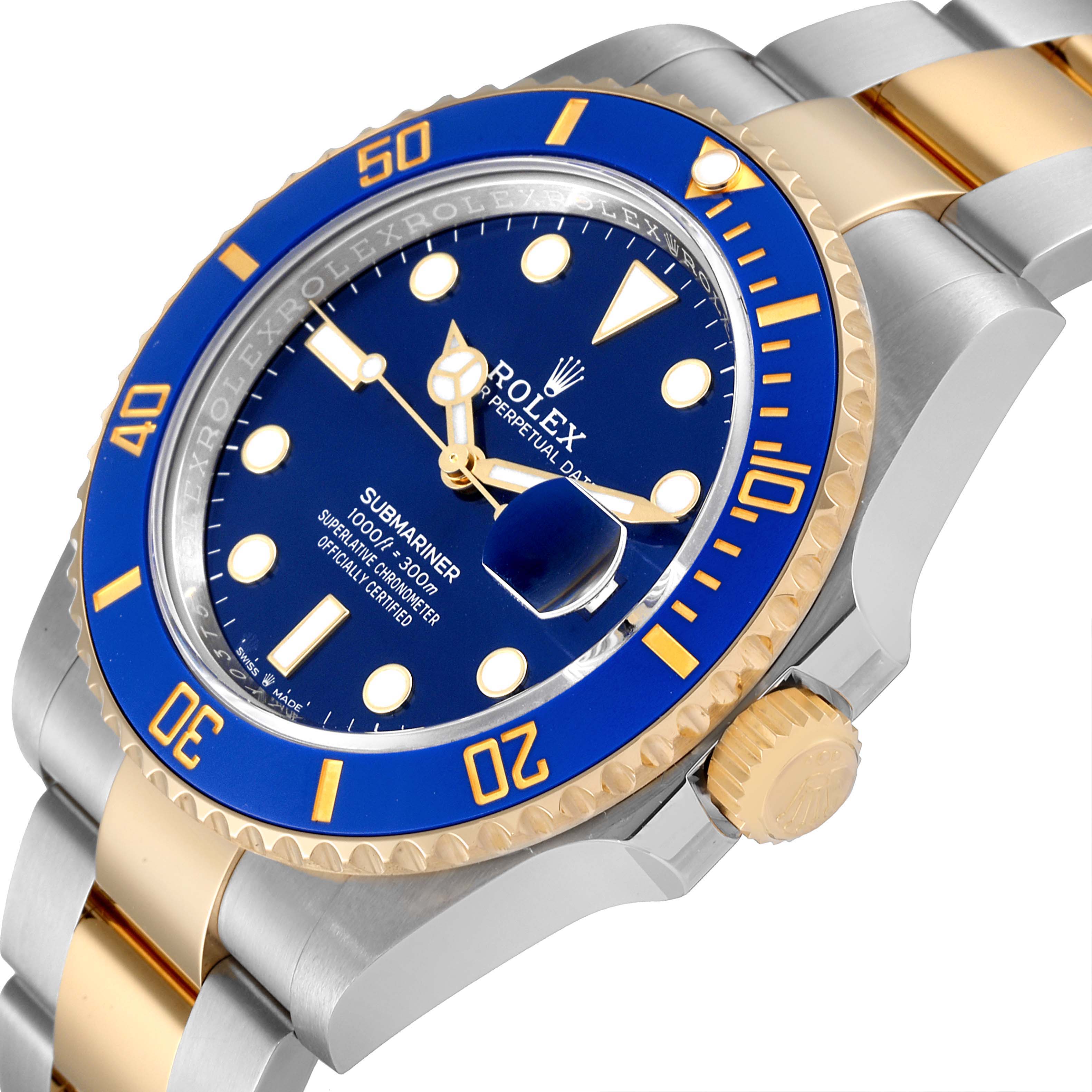 The image shows a close-up angle of the Rolex Submariner 126613 Men
s Steel and Gold (two tone) Blue Dial 126613 Men
s Steel and Gold (two tone) Blue Dial watch, highlighting the face, bezel, crown, and bracelet.