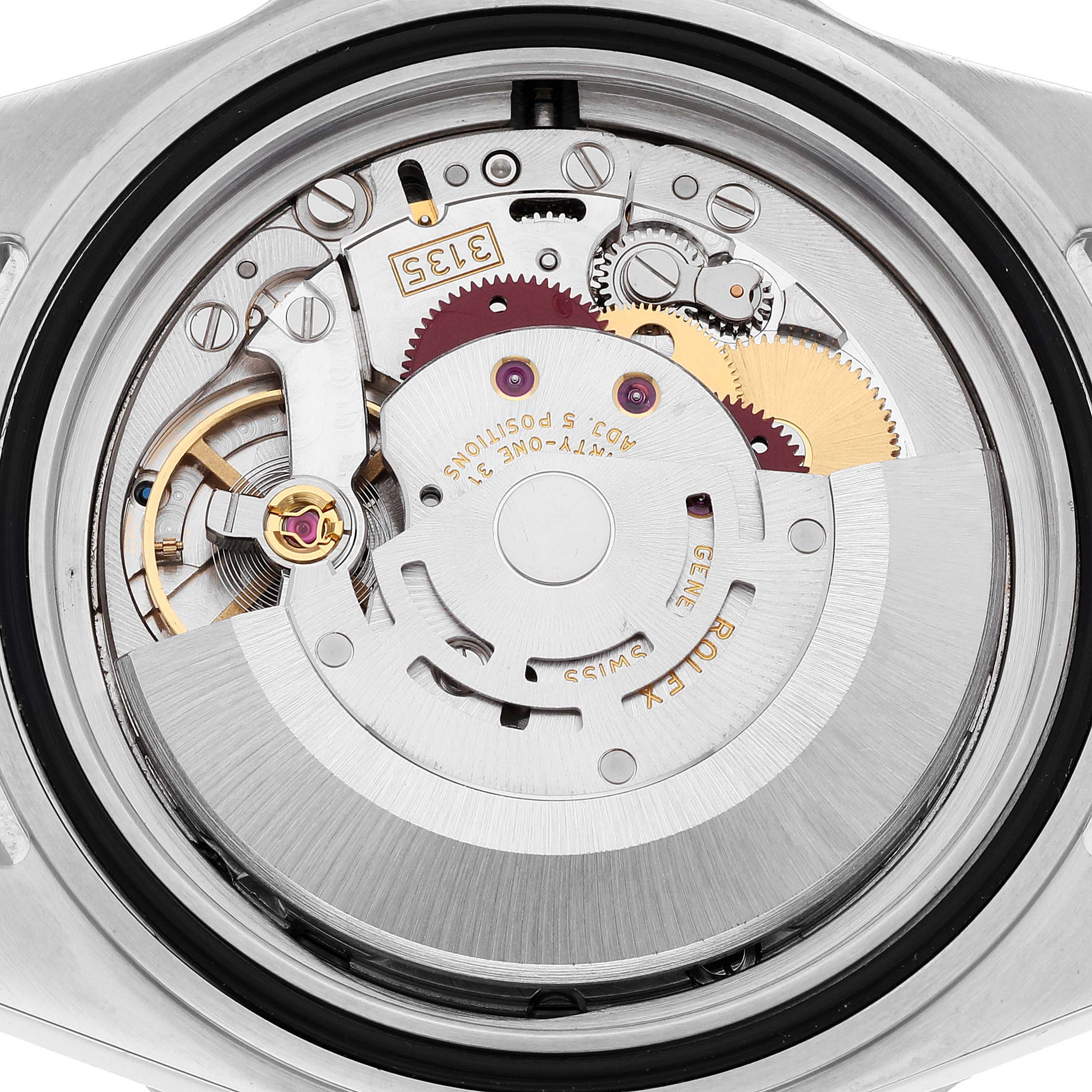 This image shows a close-up of the movement mechanism inside a Rolex Submariner 16610 Men's Stainless Steel Black Dial 16610 Men's Stainless Steel Black Dial watch.