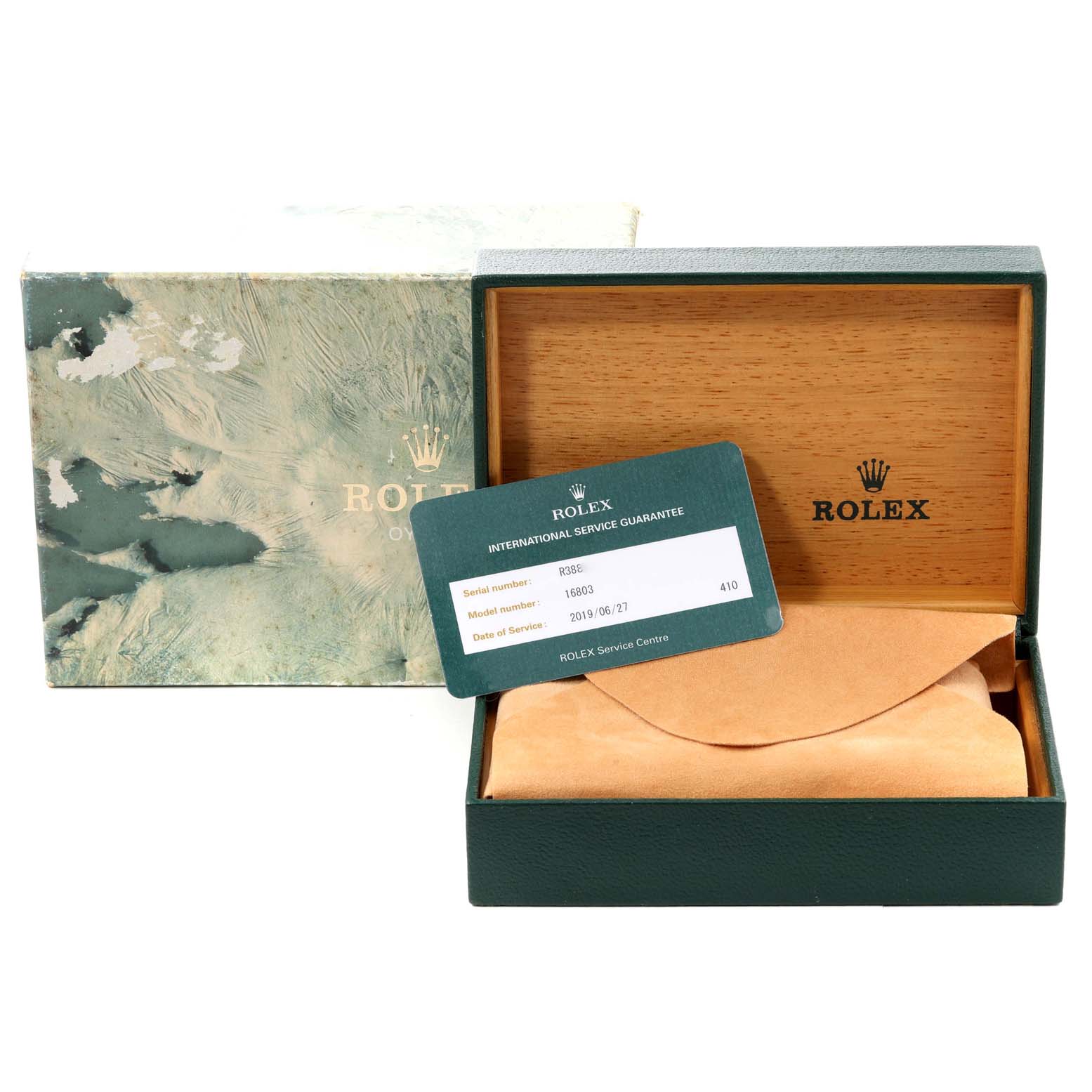 The image shows the packaging and service guarantee card for a Rolex Submariner 16803 Men's Steel and Gold (two tone) Black Dial 16803 Men's Steel and Gold (two tone) Black Dial watch.