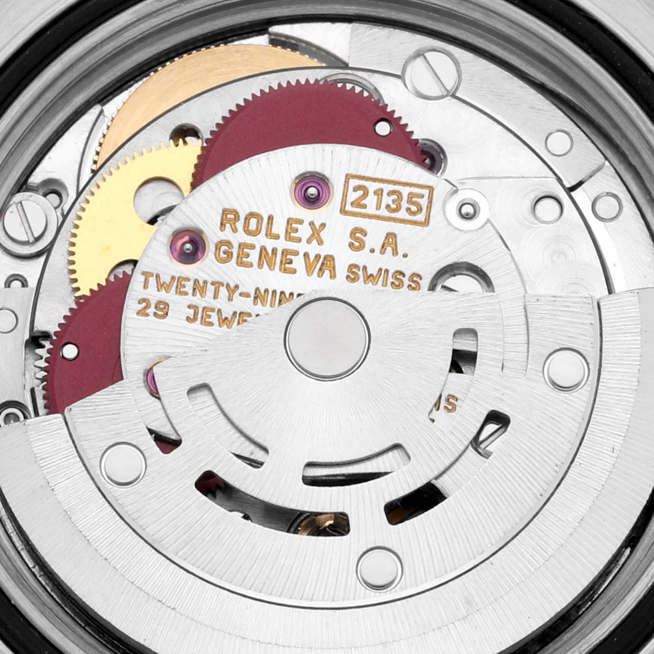 The image shows the internal movement mechanism of a Rolex Yacht-Master 69623 Women's Steel and Gold (two tone) White Dial 69623 Women's Steel and Gold (two tone) White Dial watch viewed from above with clearly visible gears and jewel bearings.