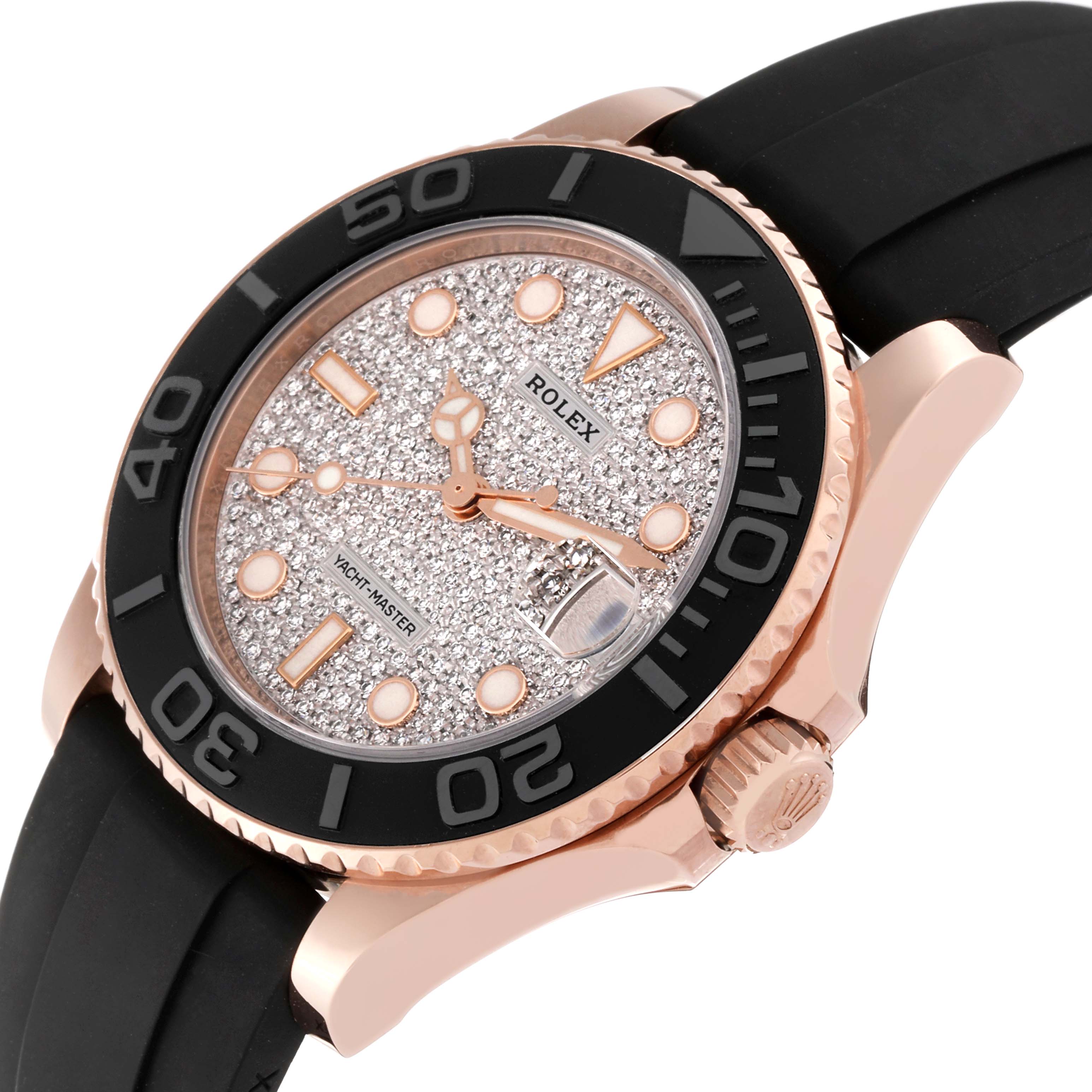 The Rolex Yacht-Master 268655 Men's Rose Gold Silver Dial 268655 Men's Rose Gold Silver Dial watch is shown at an angle, highlighting its dial, bezel, crown, and rubber strap.