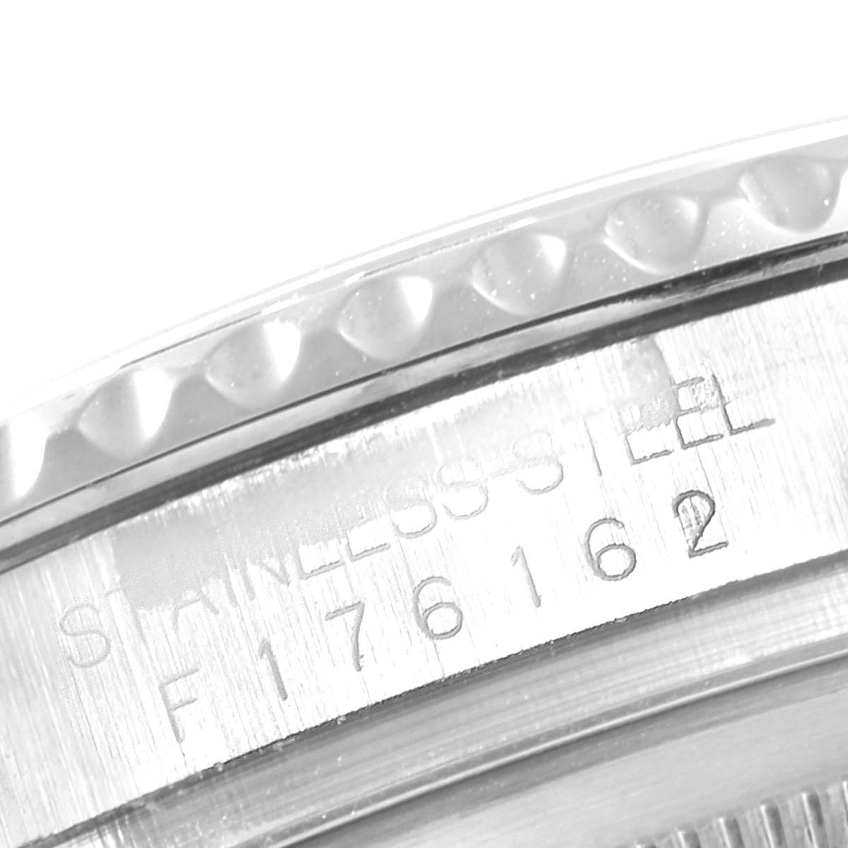 This image shows a close-up of the stainless steel case and engraved serial number of the Rolex Yacht-Master 16622 Men
s Stainless Steel Silver Dial 16622 Men
s Stainless Steel Silver Dial watch.