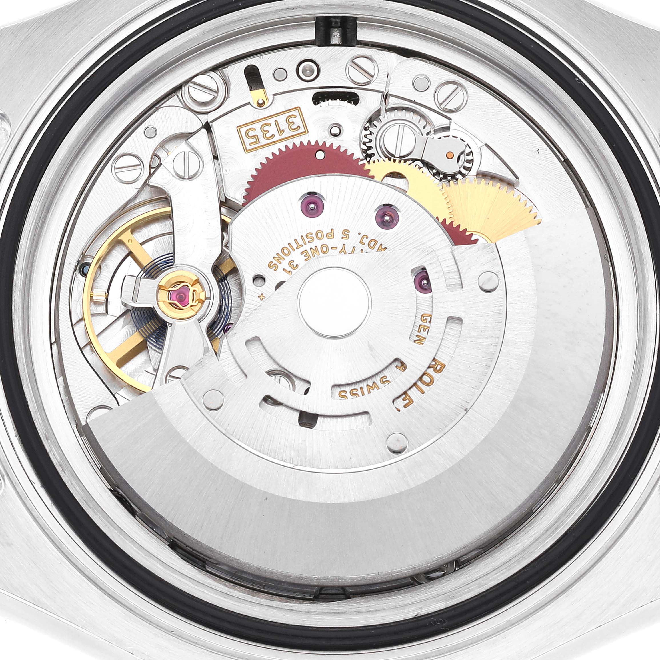 This image shows the internal mechanism of a Rolex Yacht-Master 16623 Men's Steel and Gold (two tone) Champagne Dial 16623 Men's Steel and Gold (two tone) Champagne Dial watch from a back angle, revealing the movement components.