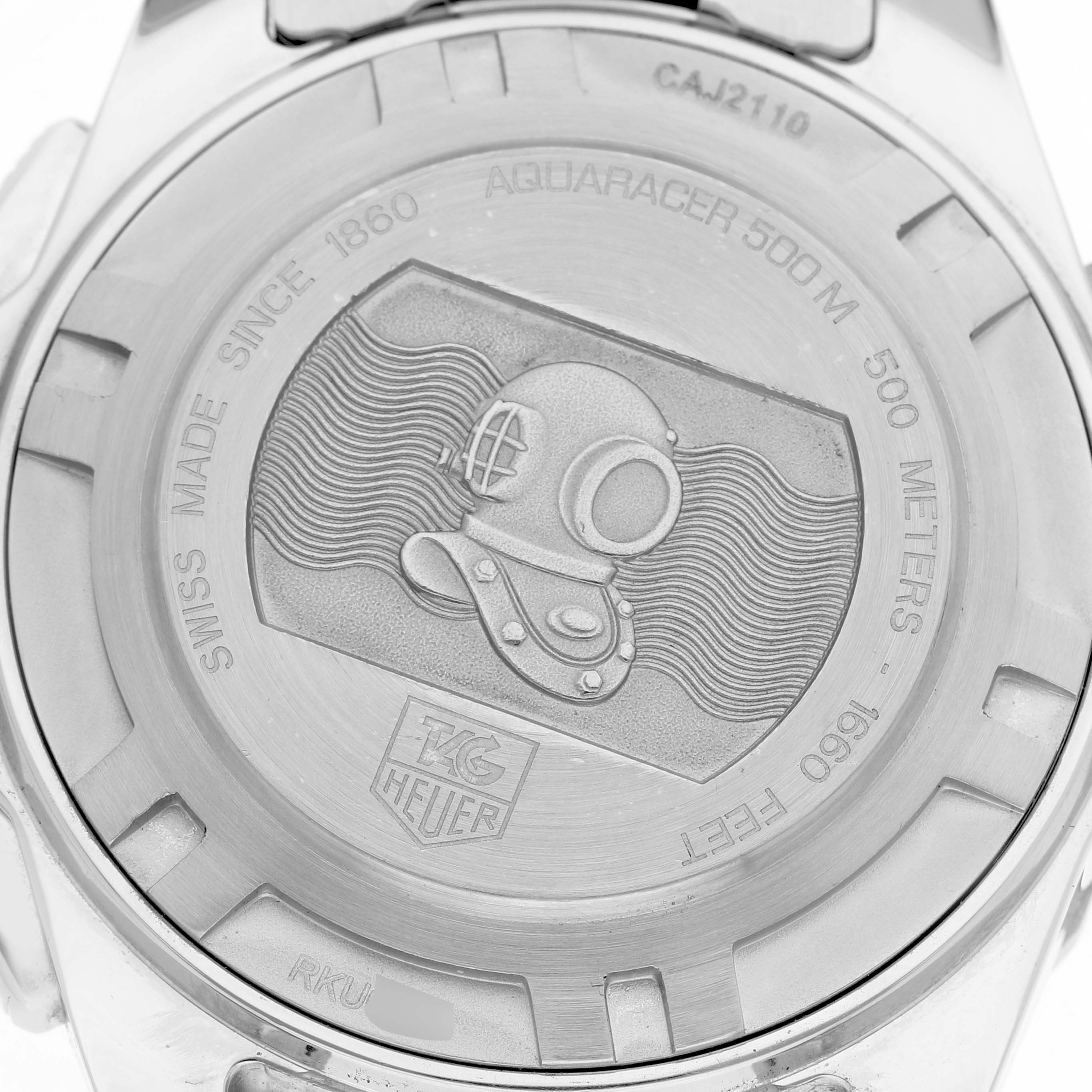 The image shows the back case of a Tag Heuer Aquaracer CAJ2110 Men's Stainless Steel Black Dial watch, featuring an engraved diver's helmet and branding details.