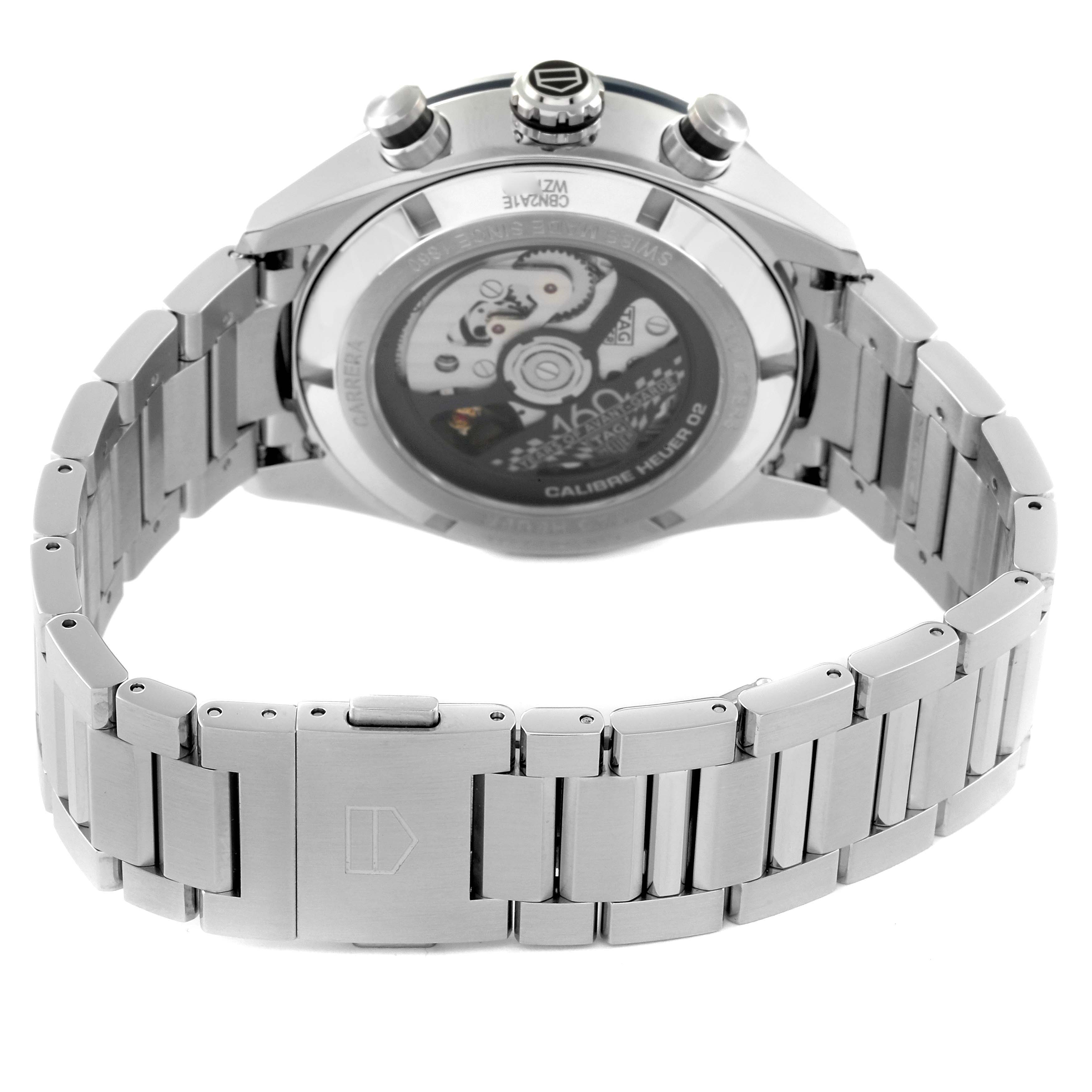 The image shows the back view of the Tag Heuer Carrera CBN2A1E.BA0643 Men's Stainless Steel Blue Dial CBN2A1E.BA0643 Men's Stainless Steel Blue Dial watch, highlighting its movement and metal bracelet.
