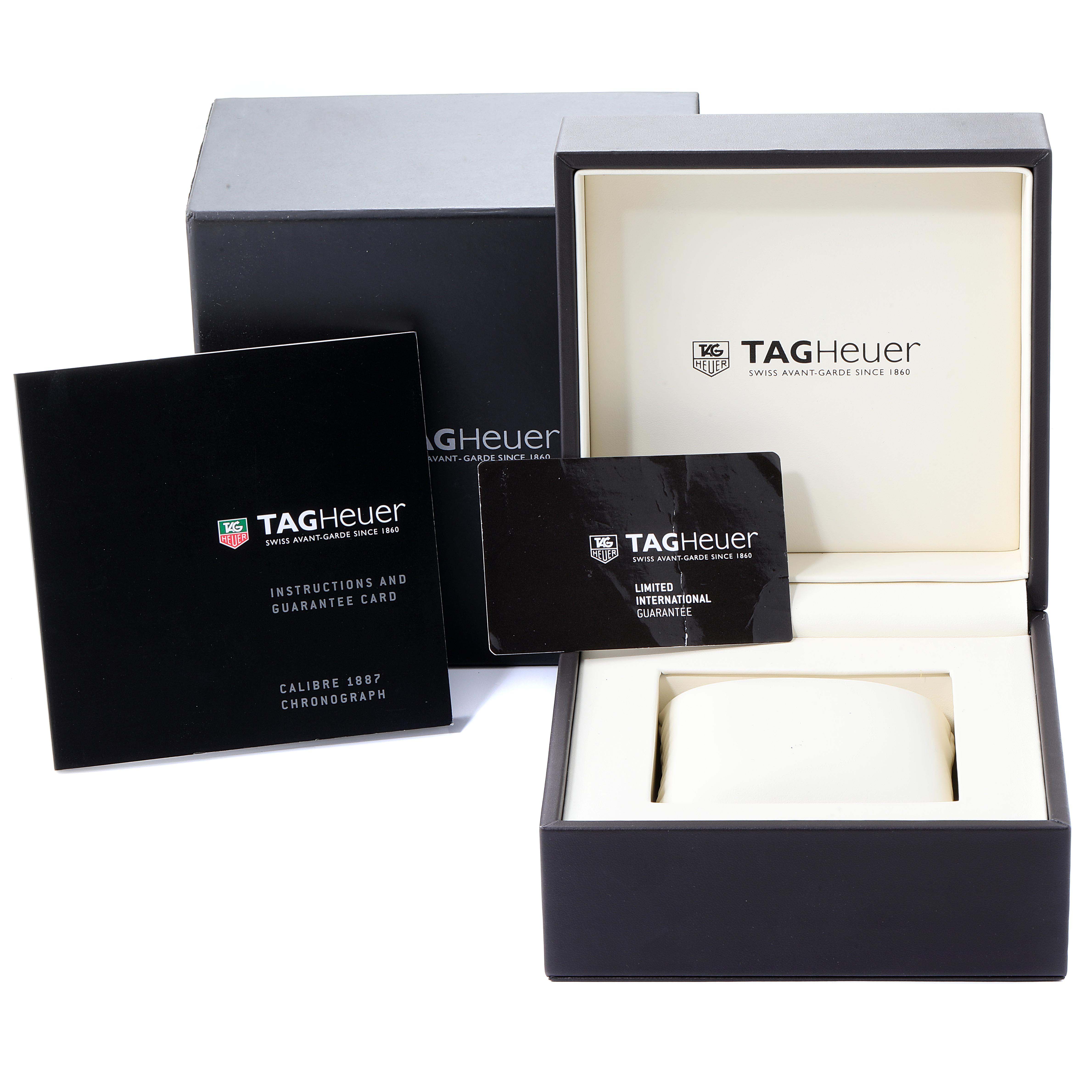 The image shows a Tag Heuer Carrera CAR2111.BA0720 Men
s Stainless Steel Silver Dial CAR2111.BA0720 Men
s Stainless Steel Silver Dial watch box, along with instruction manual, guarantee card, and outer packaging.